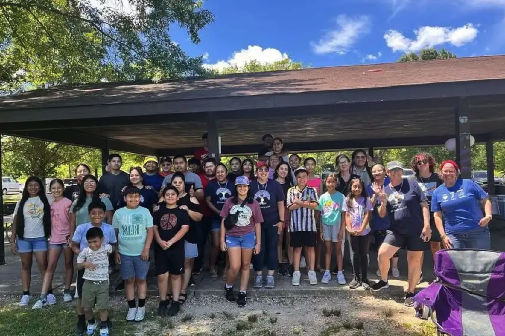 Large group of family and friends in a pavillion