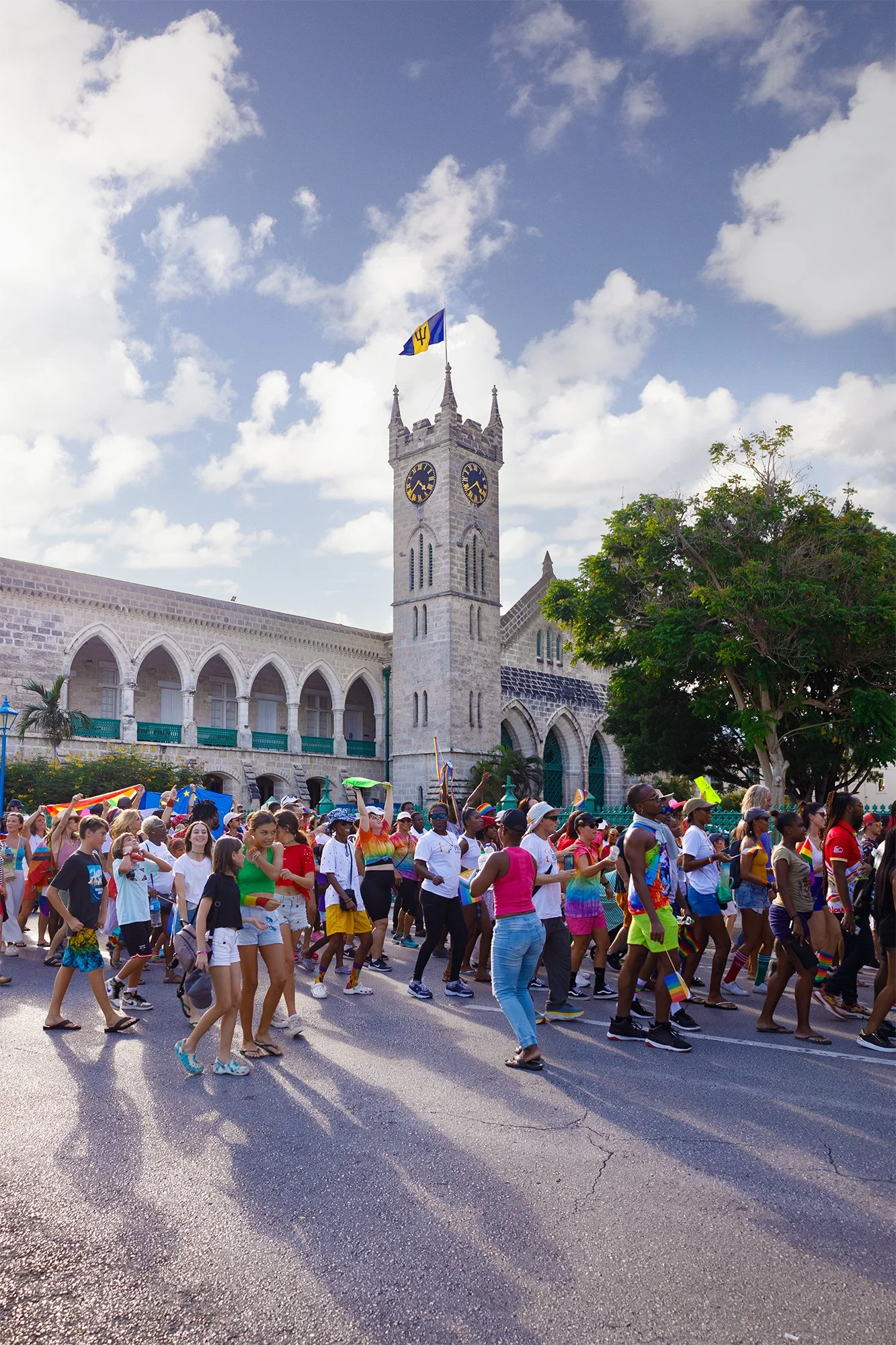 Crowd gathering outside the Barbados Parliament Buildings during Barbados Pride celebrations in Bridgetown.