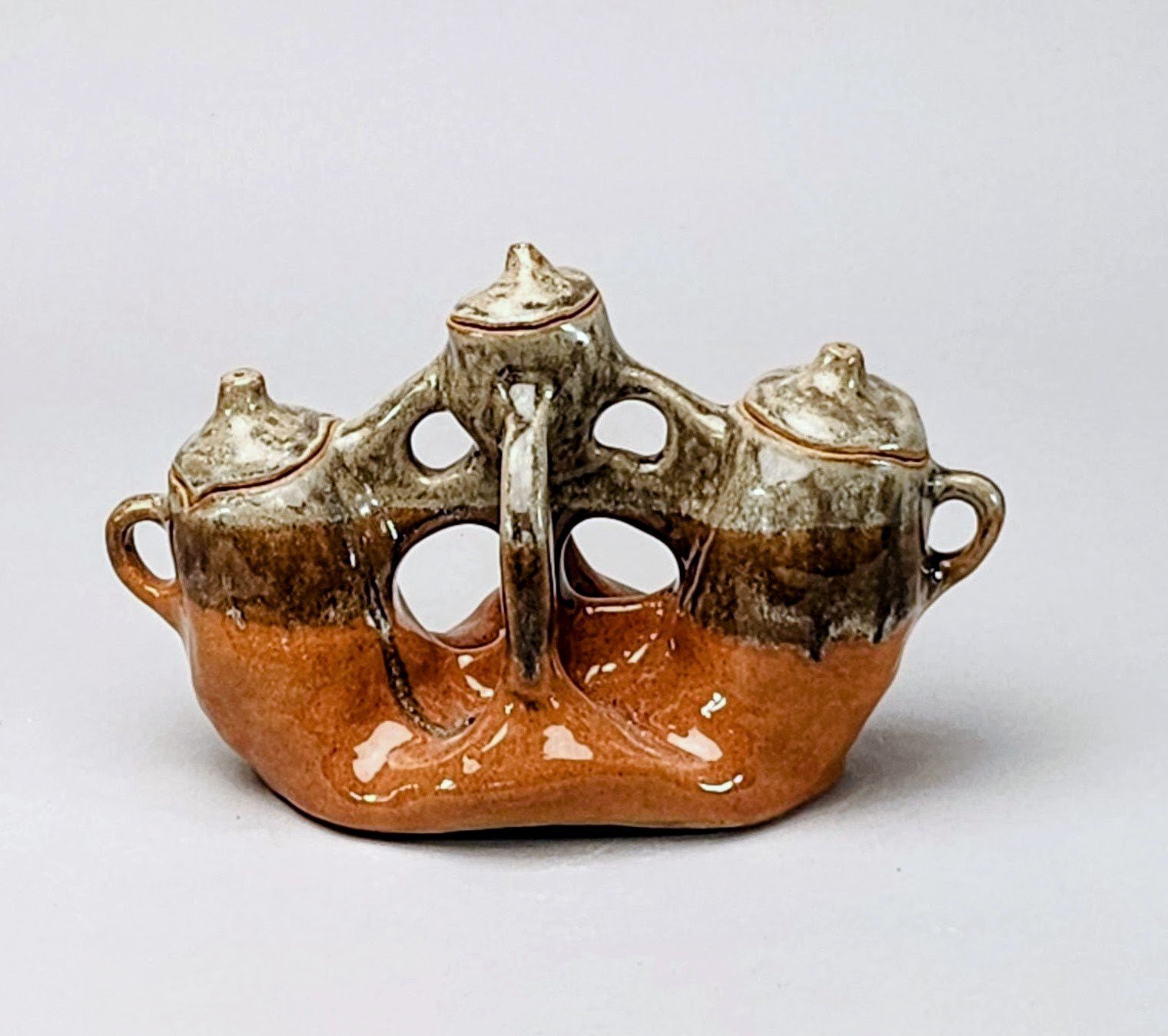 Triple lidded form, fieldmousebrown and orange sunset glaze.jpg