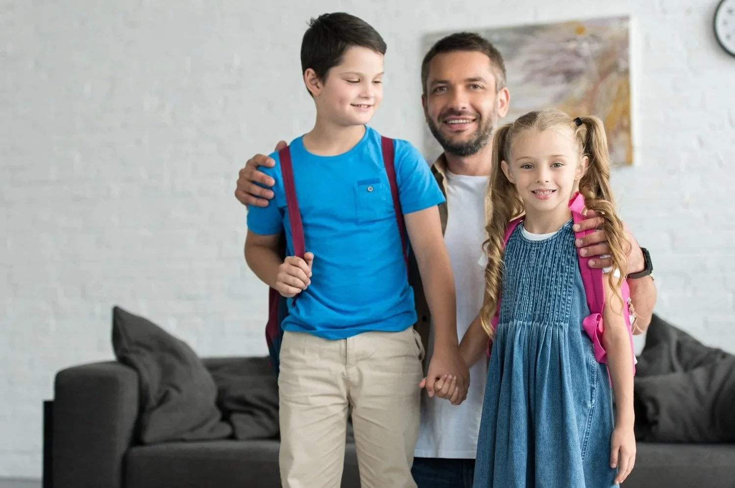 Parent and child planning a back-to-school routine together at the kitchen table