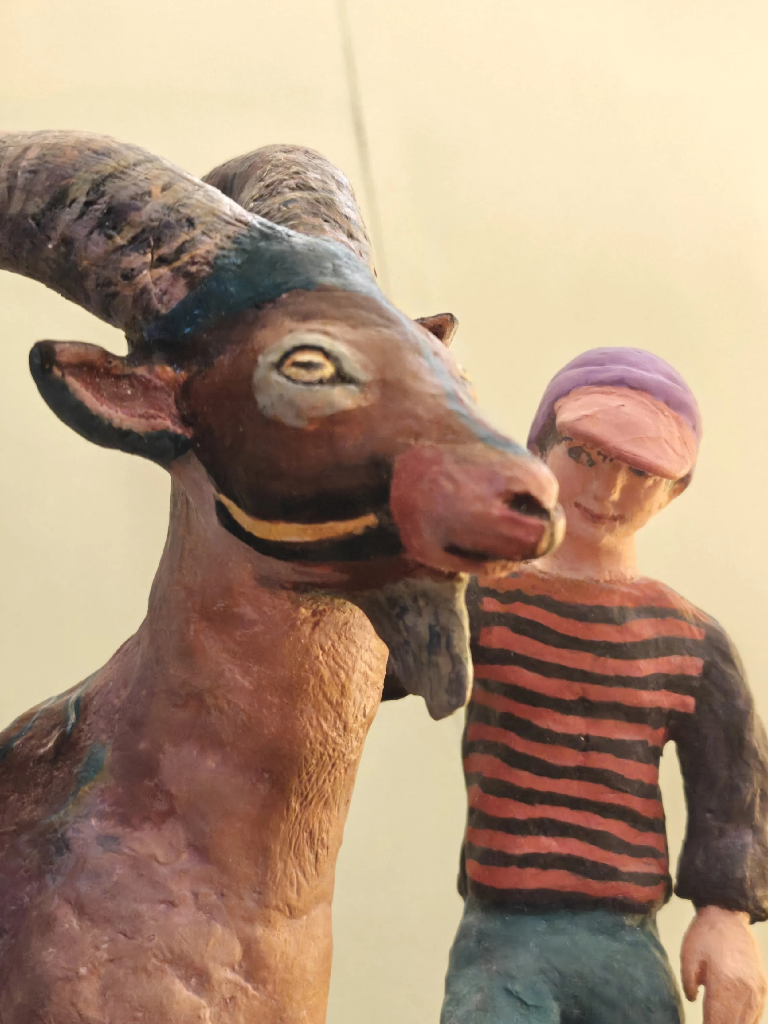 "Walking Together"
The little boy is looking at his goat with a lot of tenderness!