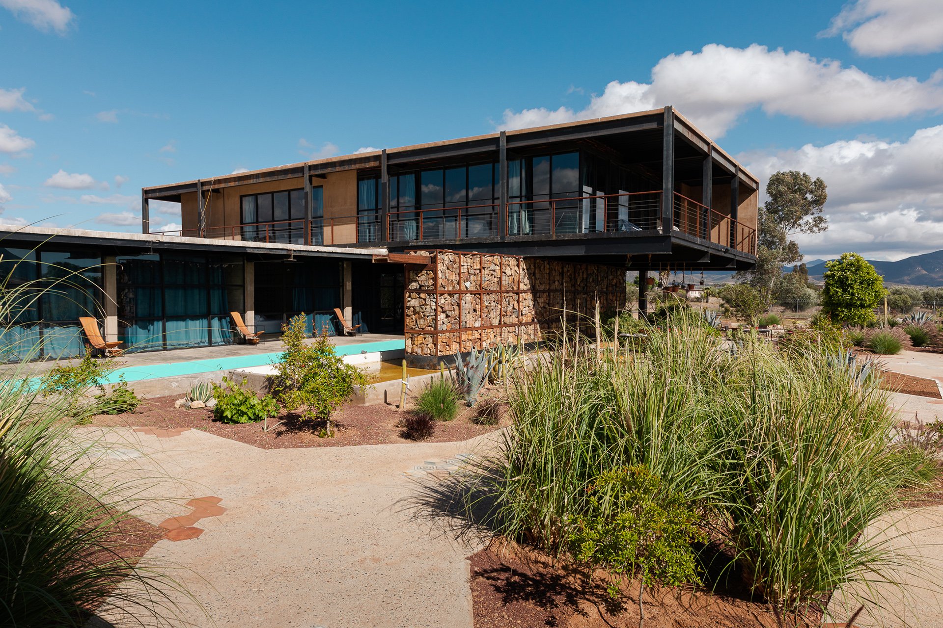 A perfect example of eco-conscious design, this space combines contemporary architecture with lush, native landscaping. My focus on spaces photography brings out the personality of properties in Mexico, Australia, Melbourne and New Zealand that value