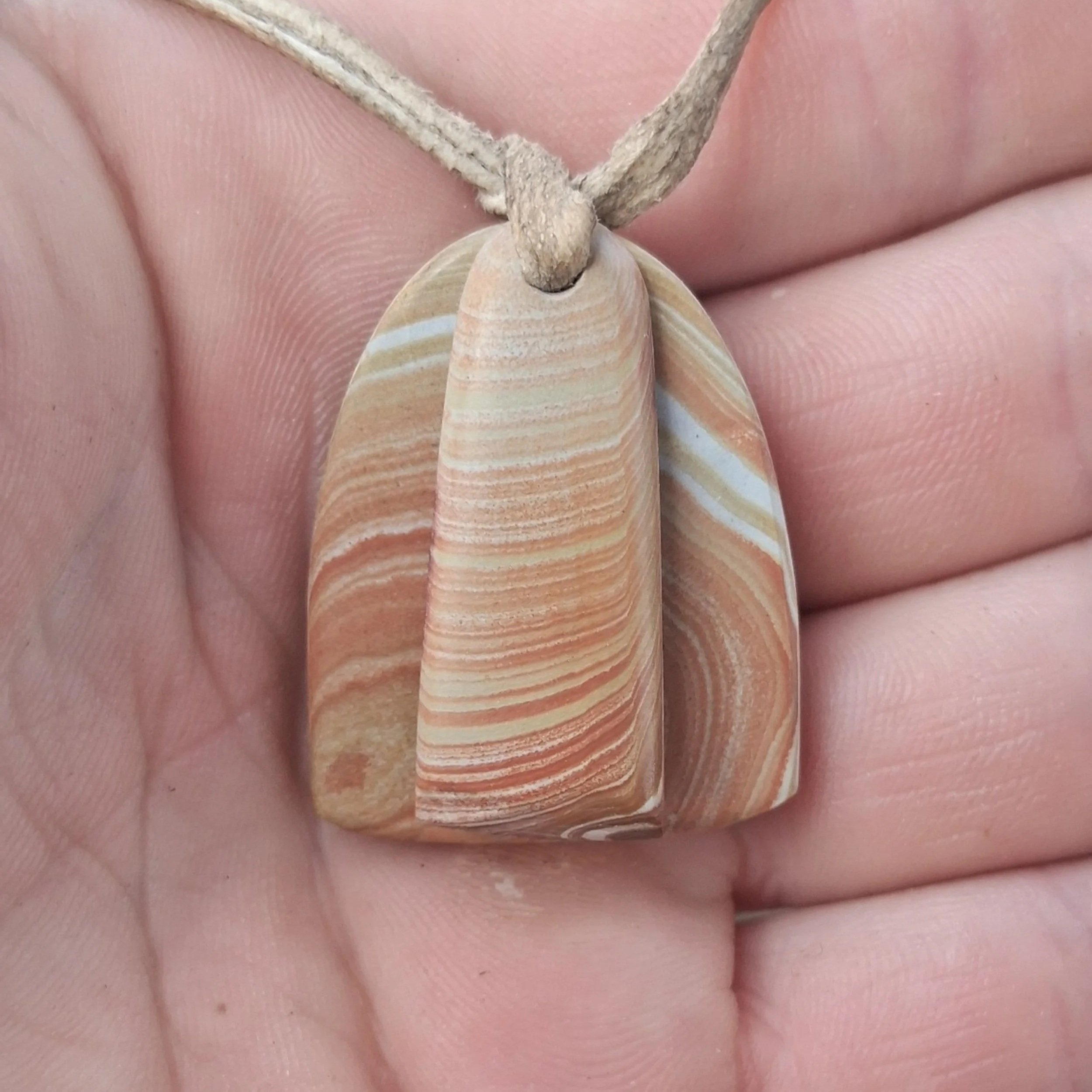 Hand Ground Stone Necklaces on Buckskin Cord