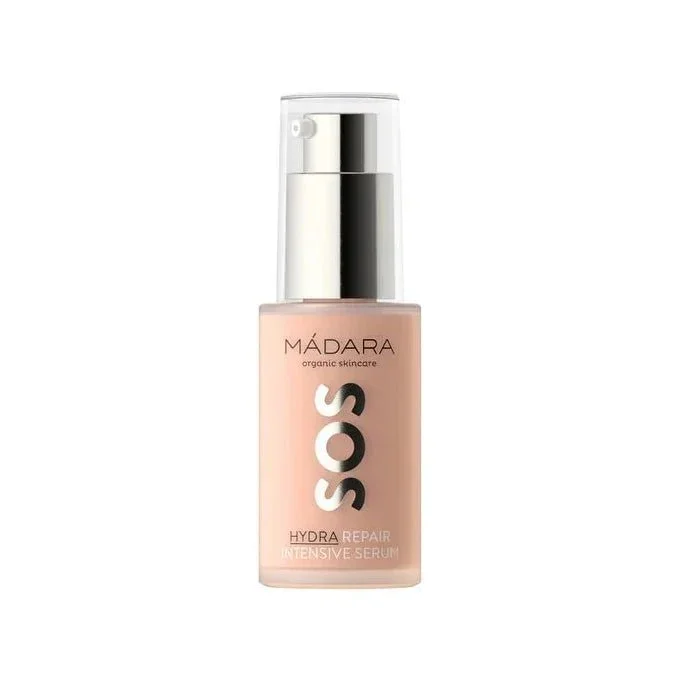 Das MÁDARA SOS HYDRA REPAIR INTENSIVE SERUM ist hier zu sehen, in einem Glasflakon