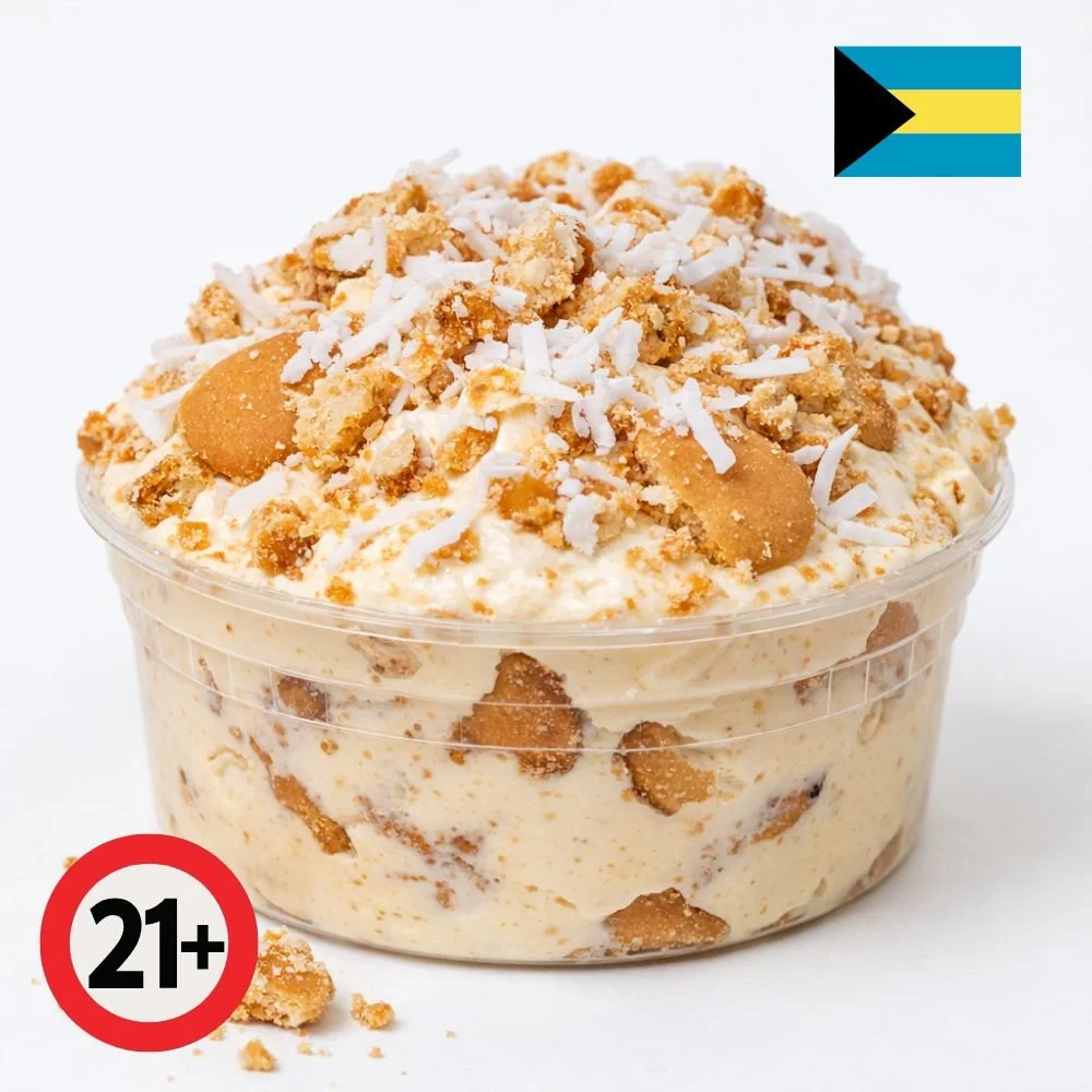 Sky Juice spiked coconut pudding topped with coconut flakes and vanilla wafers