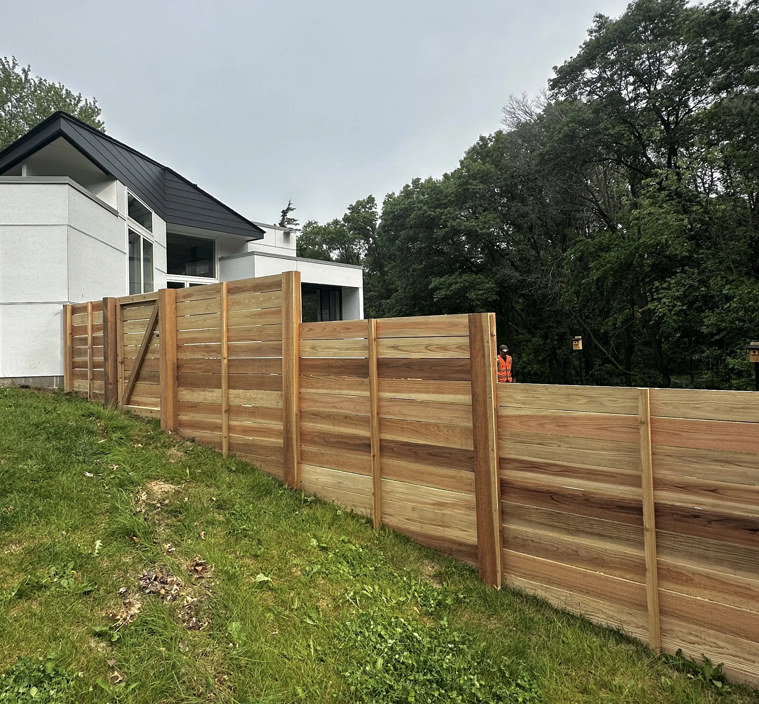 A Cedar Horizontal Privacy Fence in Afton, MN. Built with Lifetime Warranty Steel Posts and Kiln-Dried Clear Cedar. Assembled entirely with Screws.