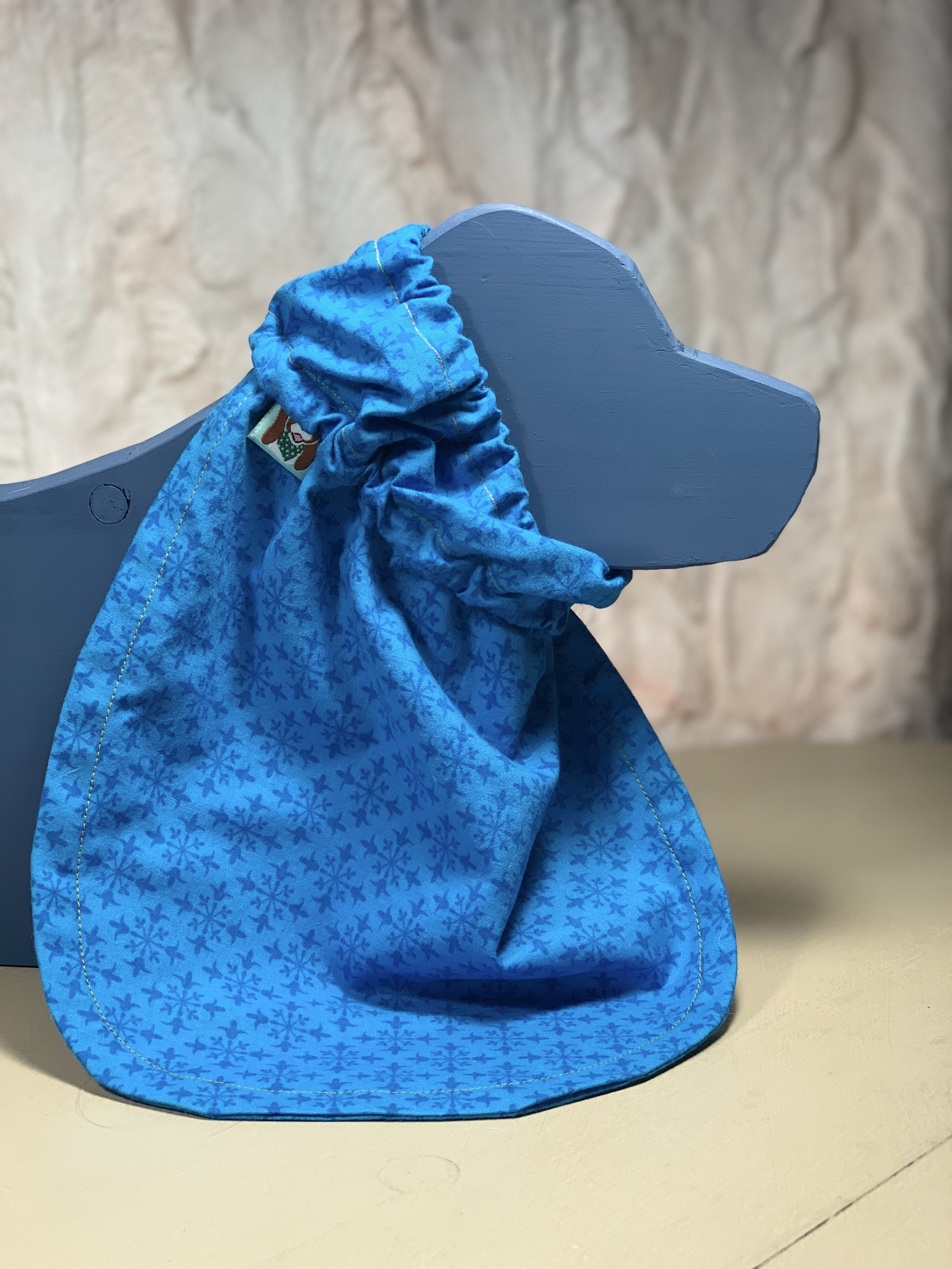 Adjustable Snood Bib with soft, absorbent terrycloth on backside