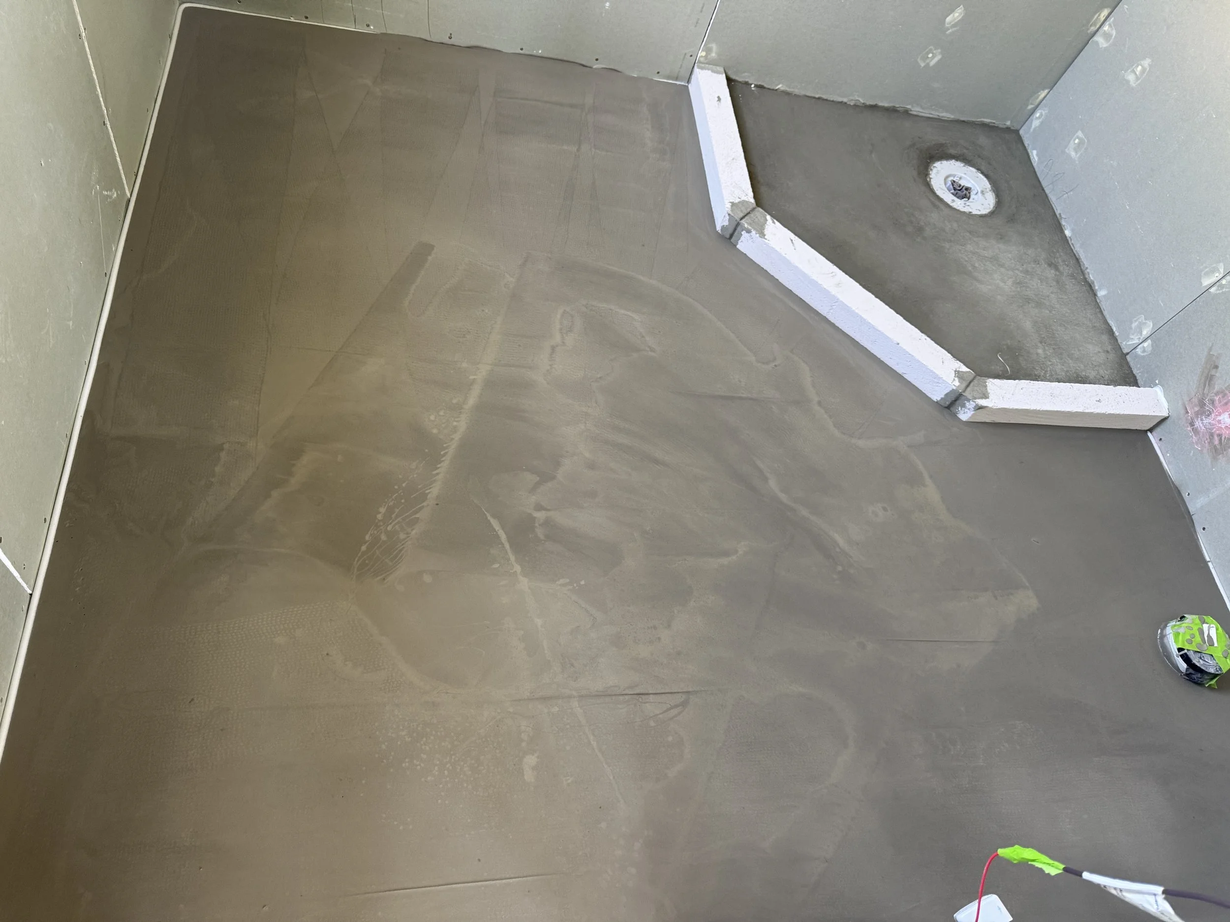 Levelling compound over Underfloor heating cable. Job in Henderson in 2025