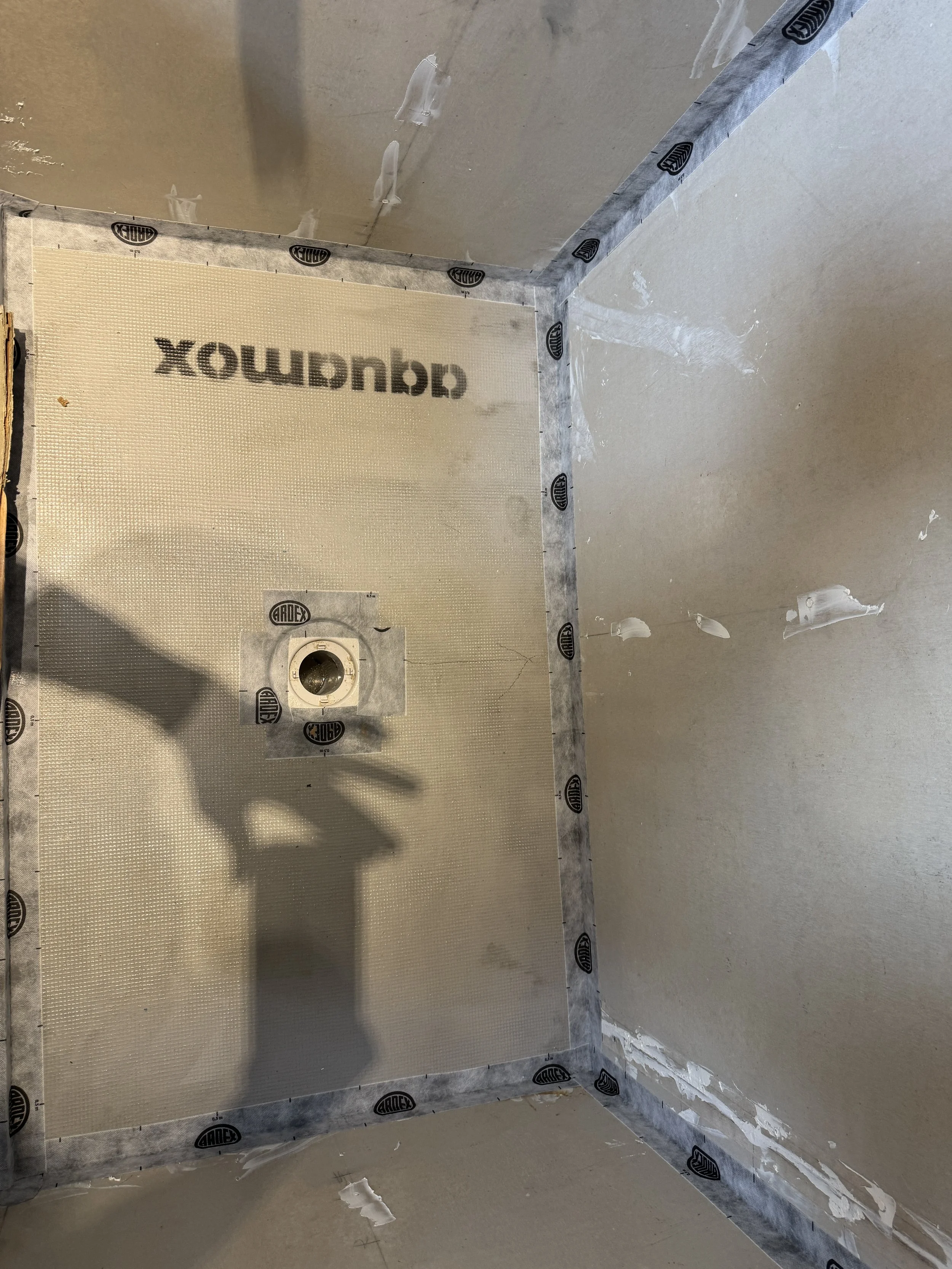 Ardex tape around shower area. Job in Mt Eden