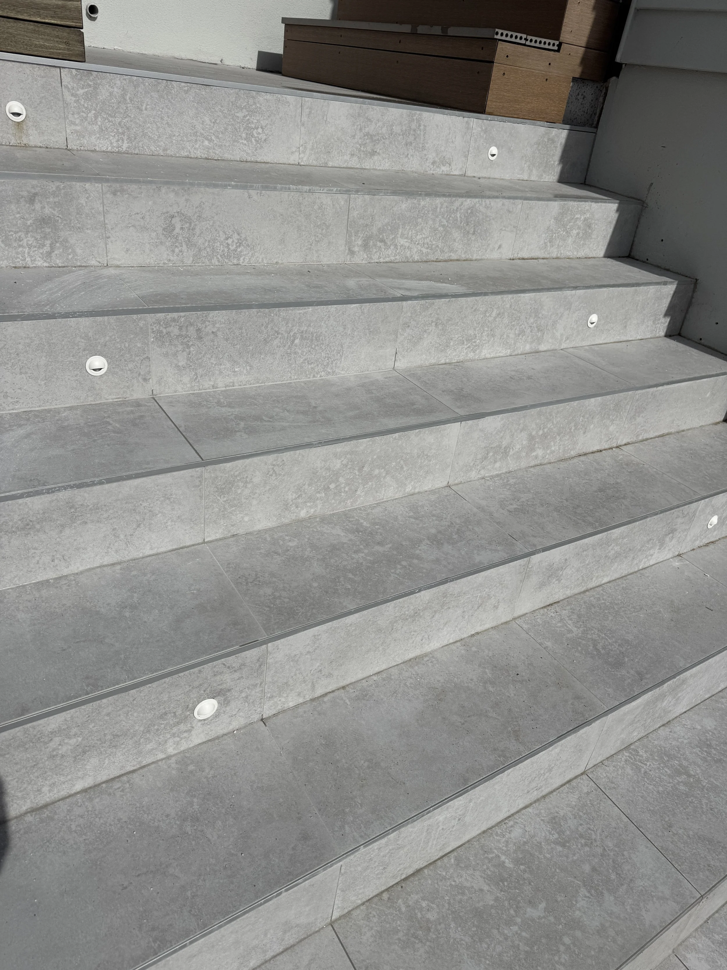 Outdoor tiling with 600x600 anti slip. Job in Milford Auckland. Done in 2026