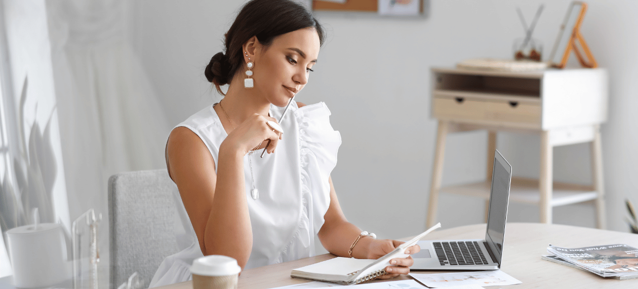 Bride researching wedding dresses and planning her bridal shopping experience
