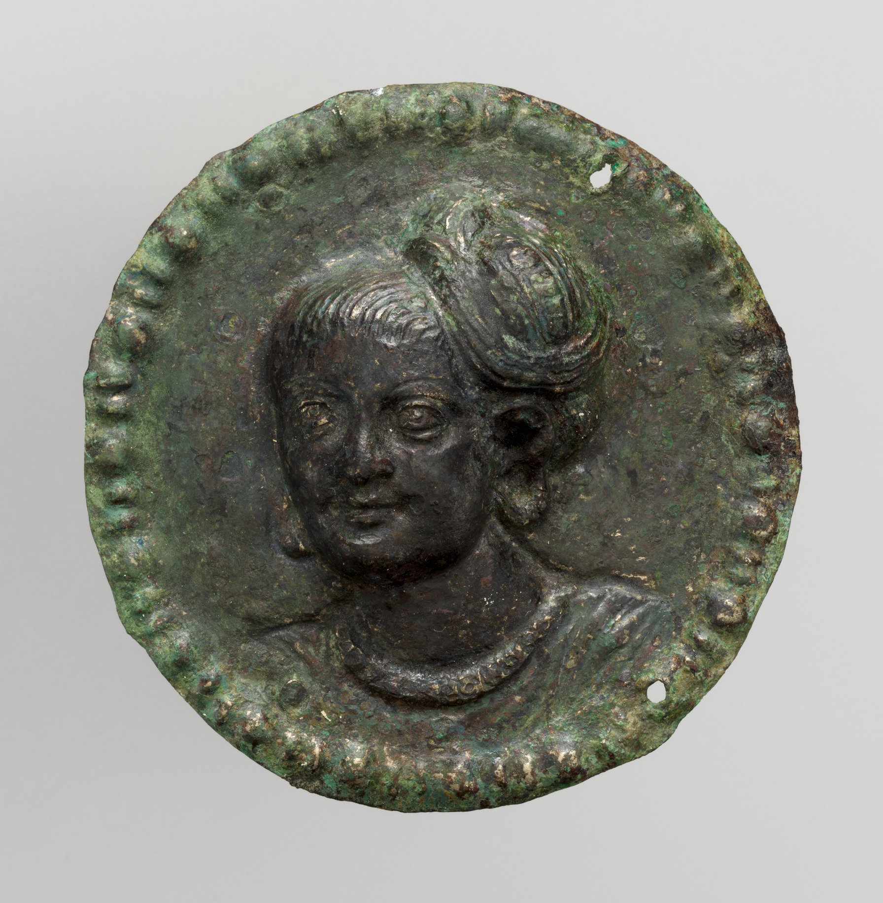 One of a pair of medallions with portrait busts.jpg