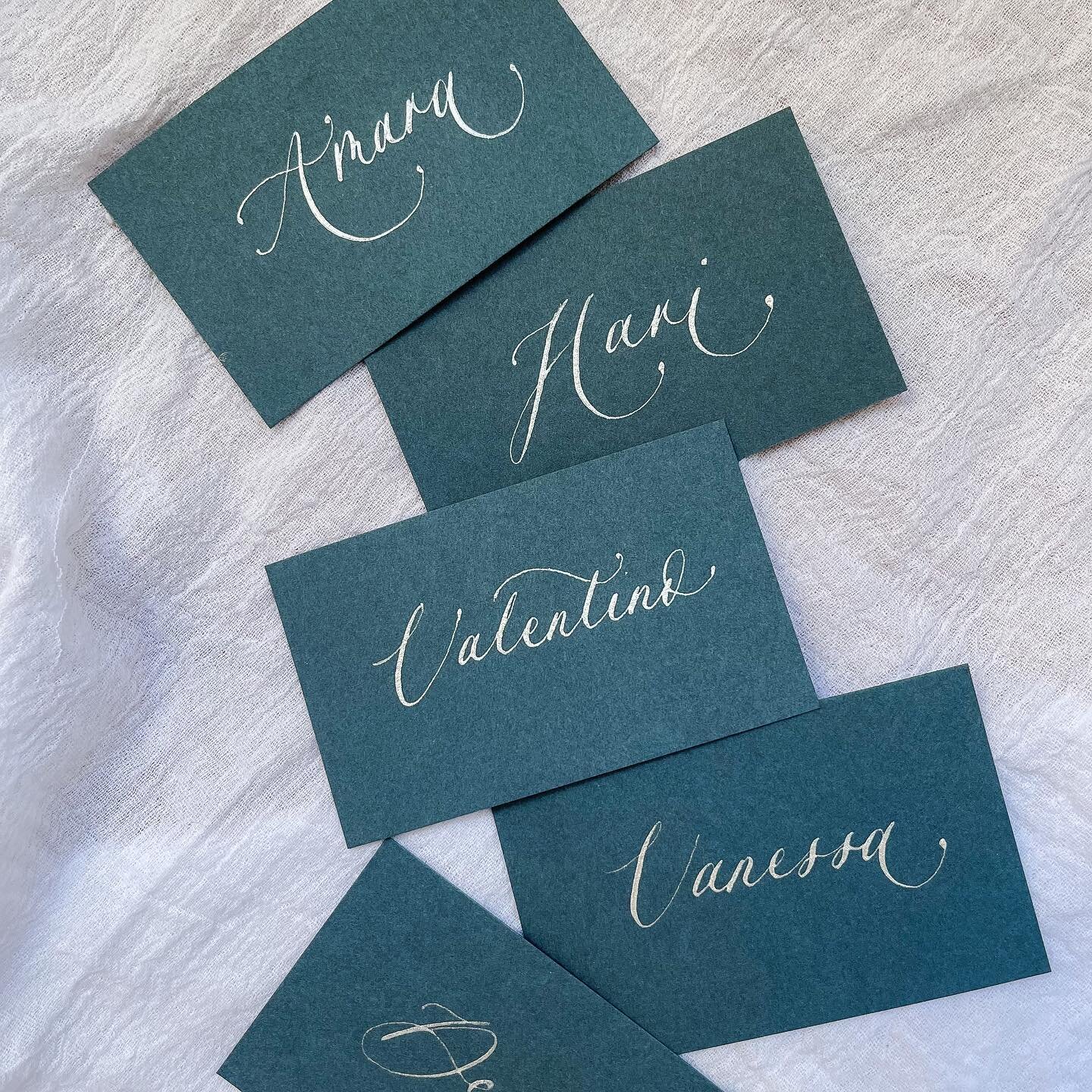 WINTER // as we head into winter months, silvers, blues and dark greens start to shine ❄️ Marina blue place cards with silver ink calligraphy can be a good choice if you&rsquo;re colour palette features blues xx 
.
.
.
.
.
.
.
.
.
#calligraphy #weddi