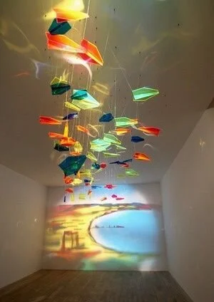 This Painting Is Made Using Light and Plexiglass Airplanes.jpeg