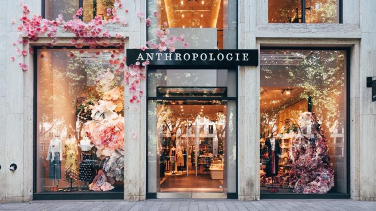 Anthropologie - windows are made using hand cut pieces of recycled paper from old anthro bags, catalogues, books, magazines..jpeg