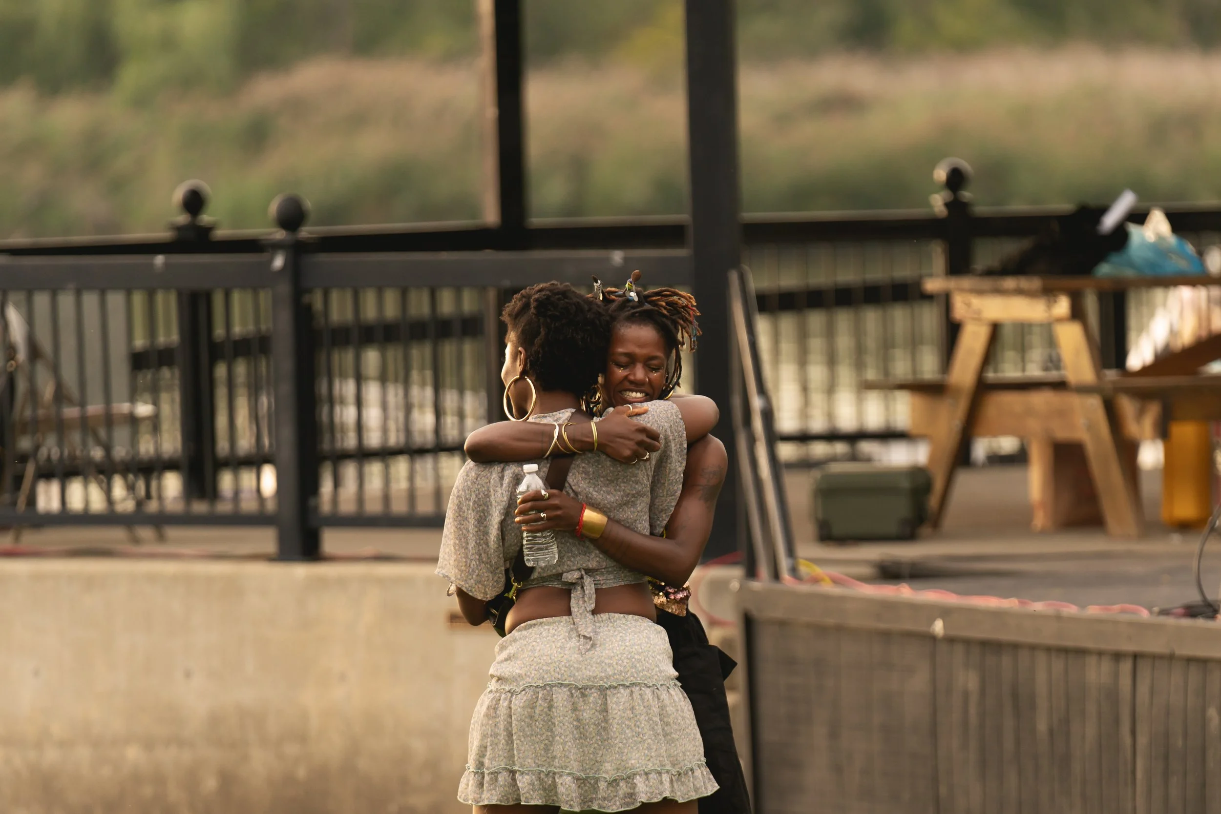Two black women hugging to portray compassion
