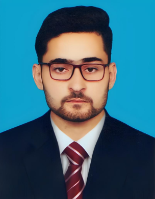 Professional headshot of a man wearing a dark suit, white shirt, and red striped tie, with short dark hair, glasses, and a neutral expression, set against a blue background.