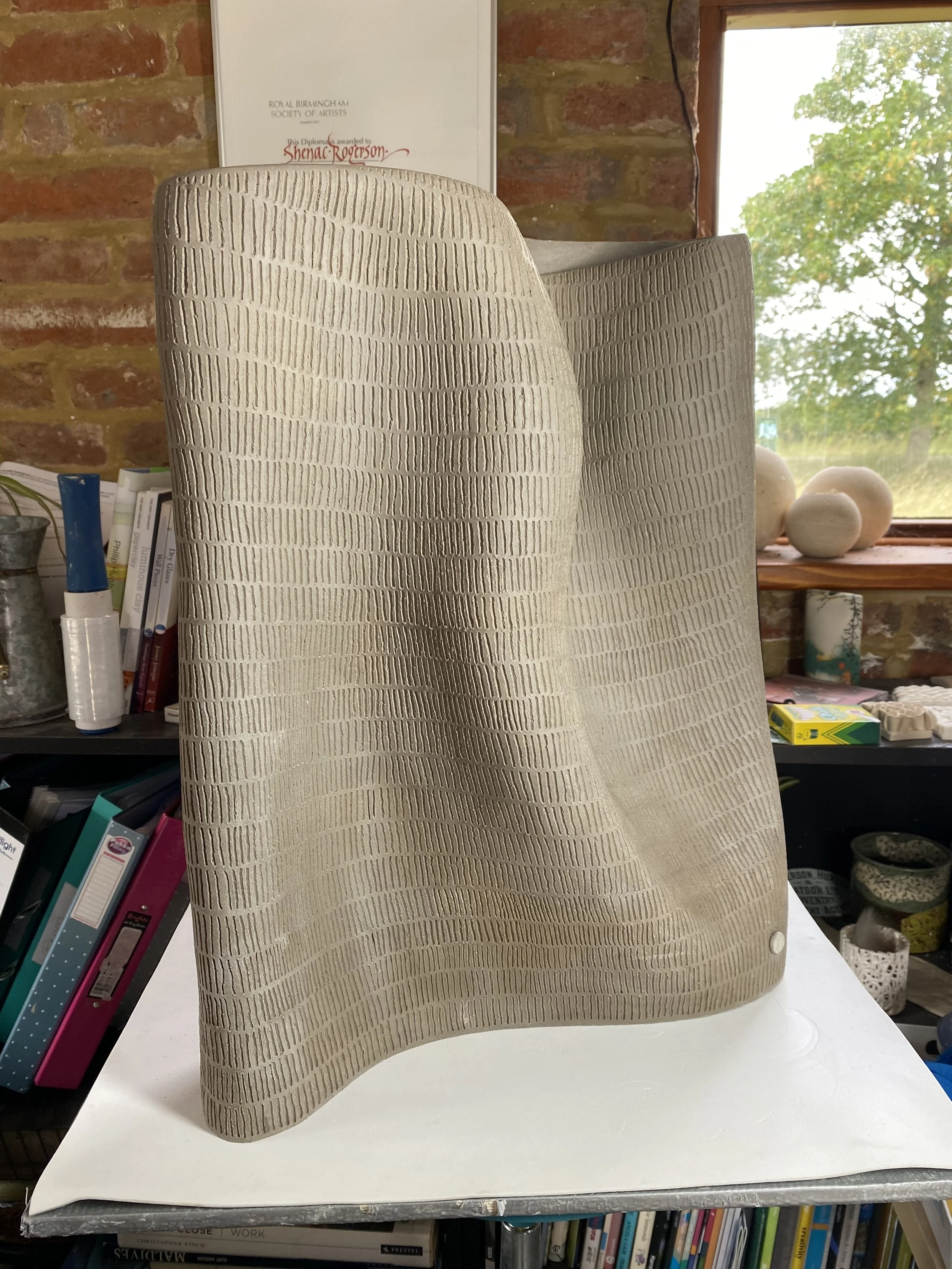 finished, but unfired (back)