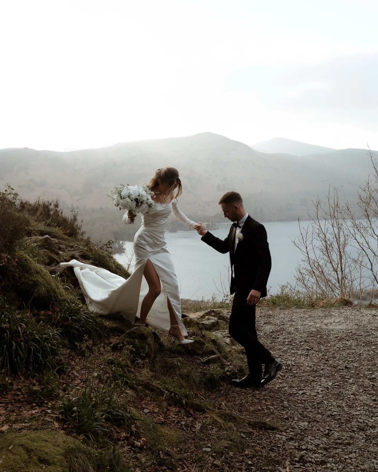 Amy &amp; Tom // 

The first one of the year and what a way to kick things off. 

The lakes had it all. 

Wind, rain and sun. (Mainly wind) - but these two took everything in their stride and had a wicked day with their closest family &amp; friends. 