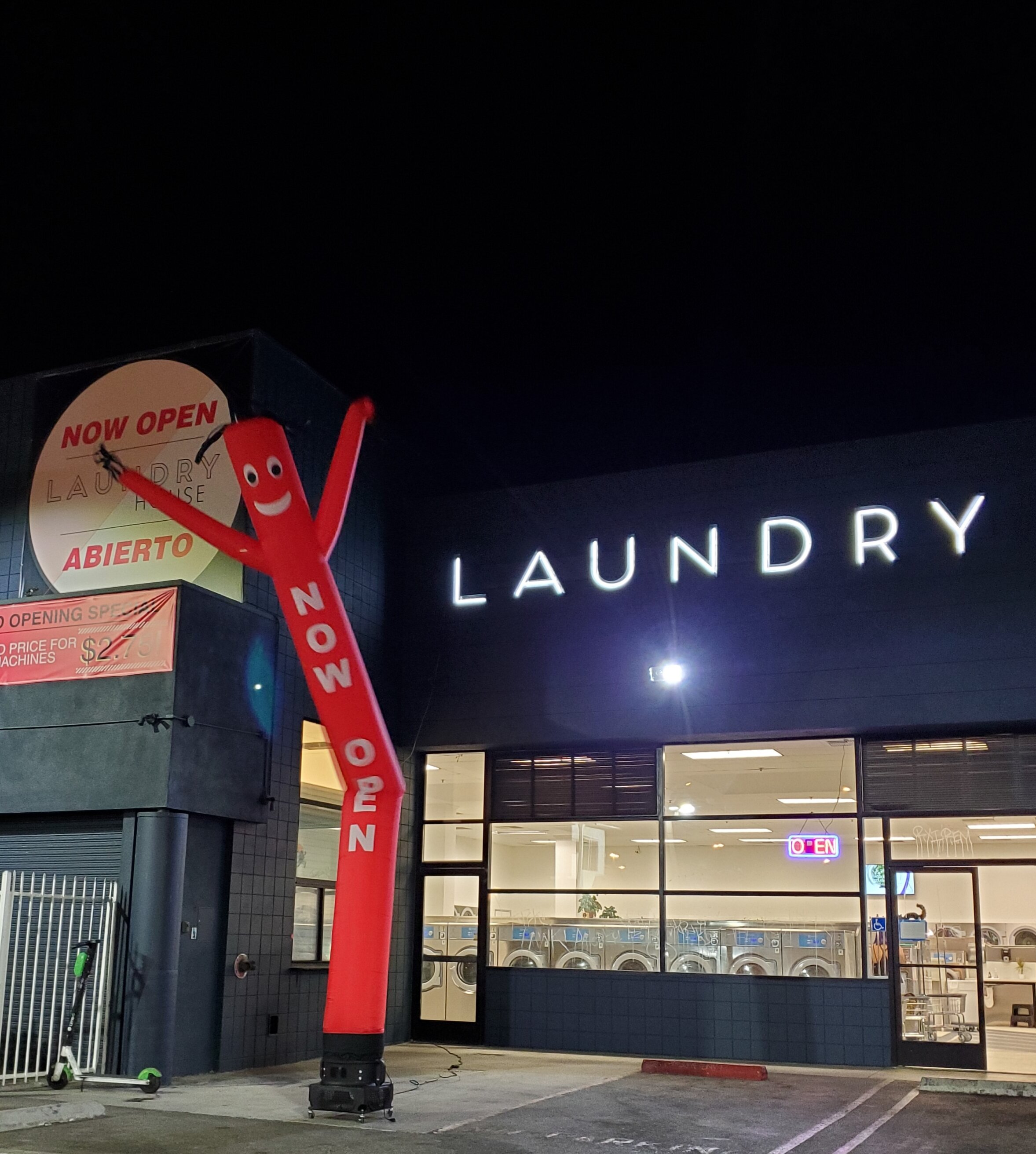 laundry sign at night