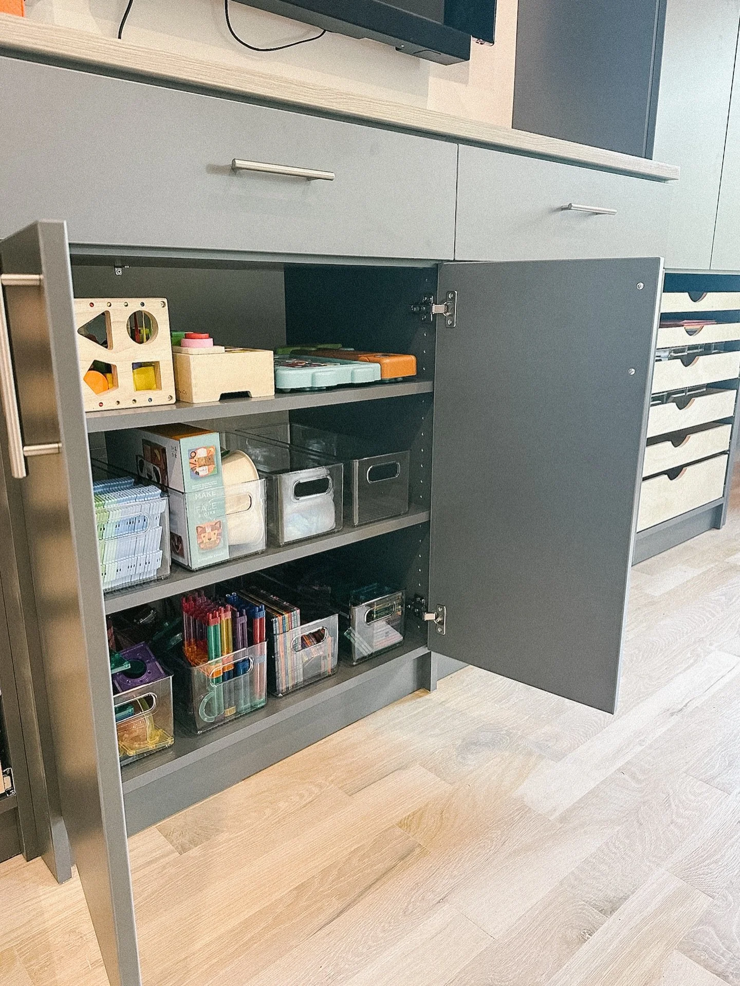 Proof that functional can still feel beautiful ✨

This playroom transformation came together so seamlessly thanks to the custom design and install by @inspiredclosetstulsa 👏🏼 We loved bringing the finishing touch with organizing systems &amp; produ