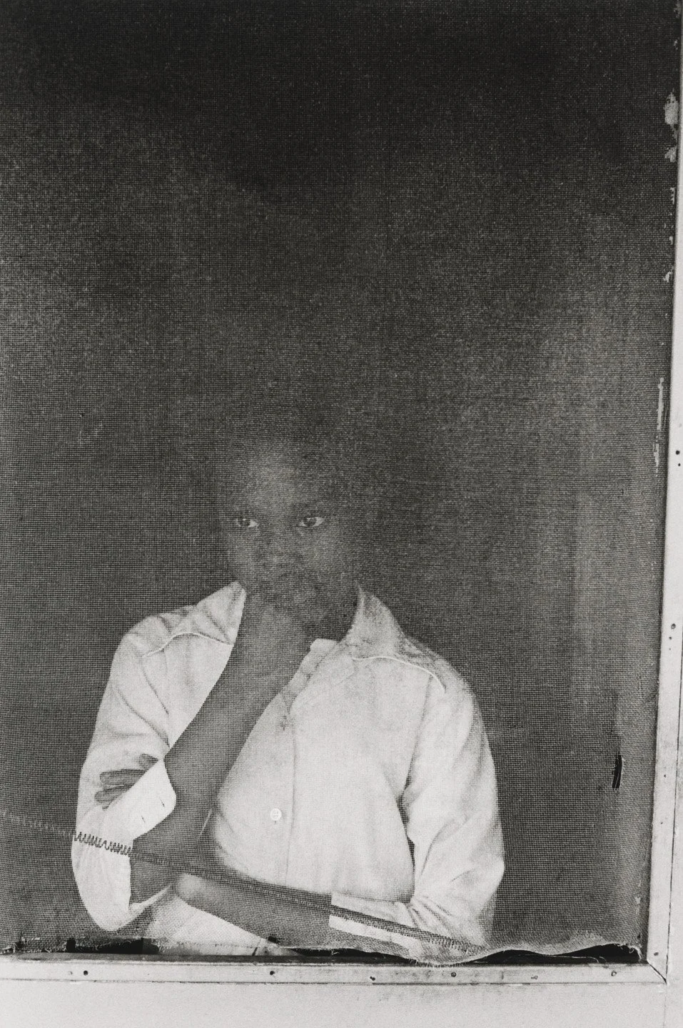 Girl in Screen Door, Edisto Island, South Carolina, Ed. AP, 1979, Gelatin silver print, printed by the artist, 11 x 14 in