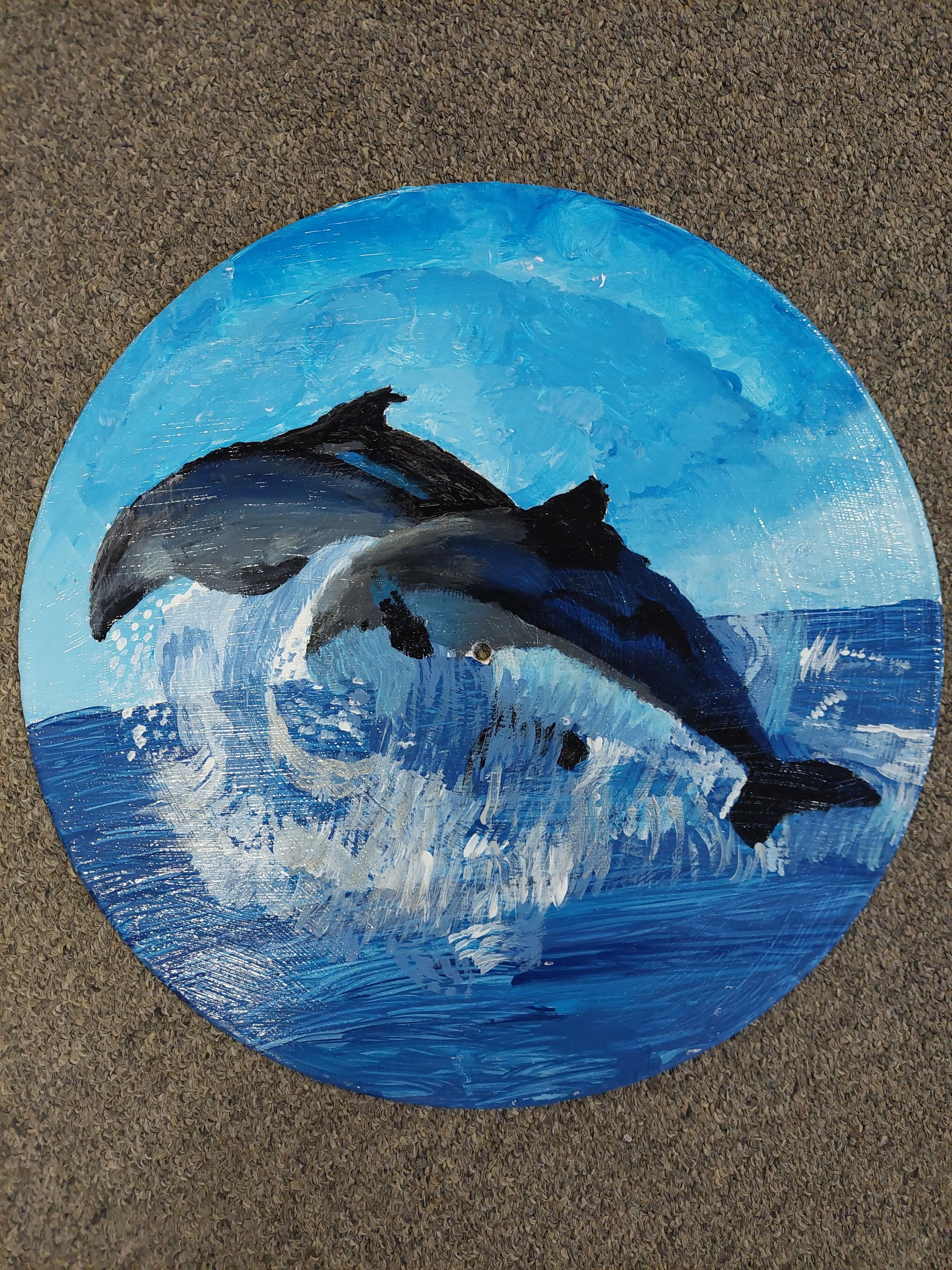 "Dolphins Splashing in the Waves" by Kelly Johnson