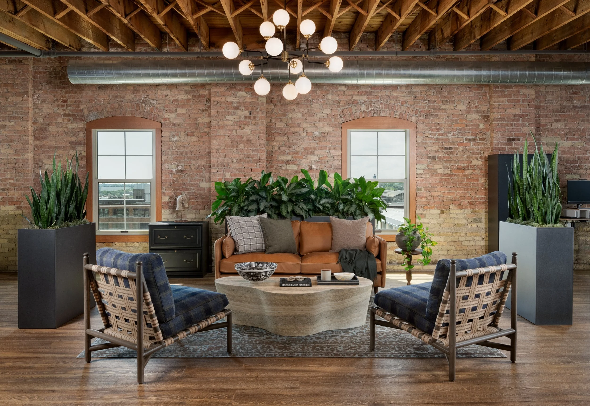 Not your corner office.

Cream City brick, exposed timber, and a few unexpected choices make this Milwaukee workplace anything but business as usual.

Photo: @landrephoto