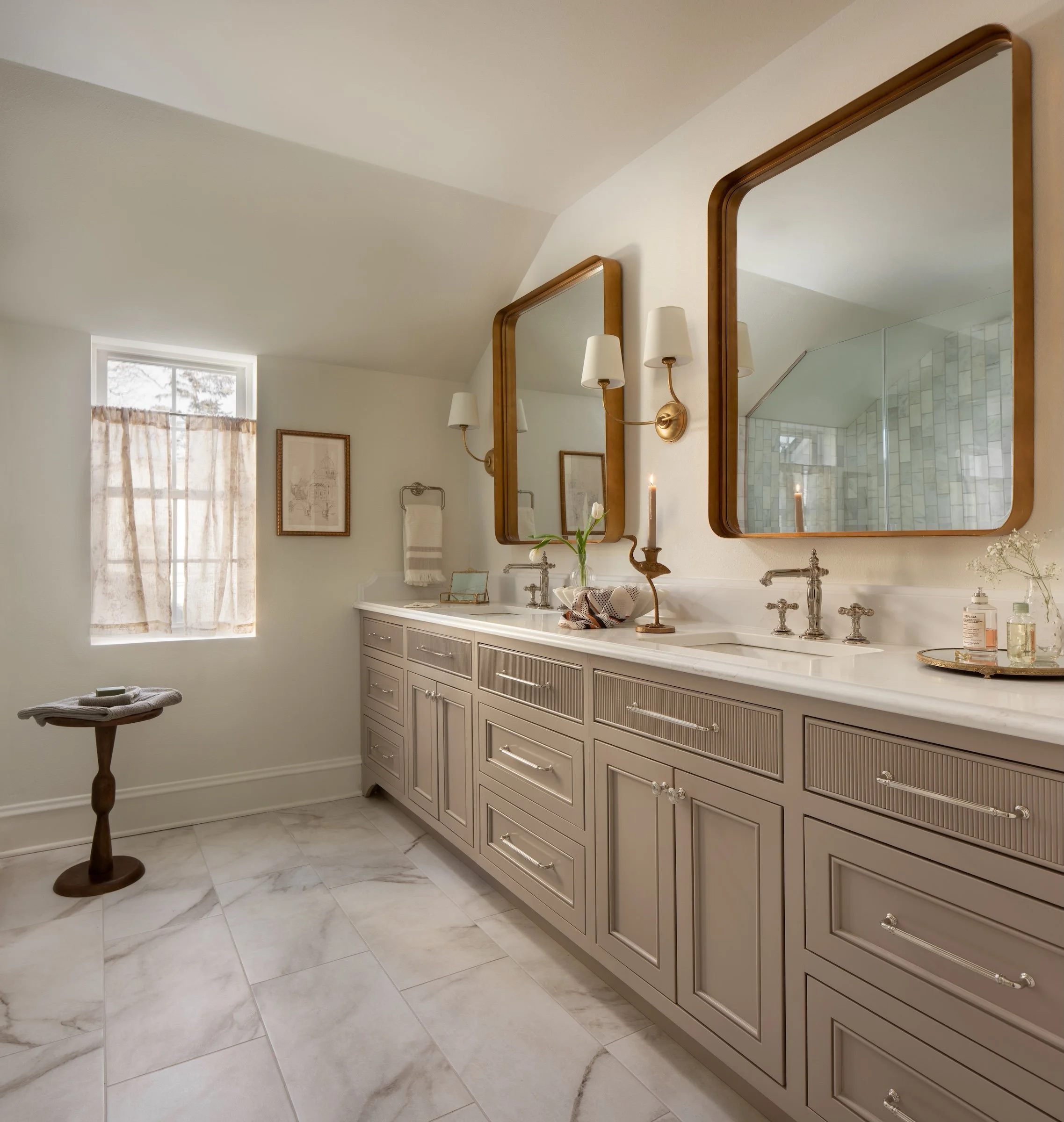 Whitefish Bay Tudor primary bathroom with custom reeded cabinet fronts and double vanity