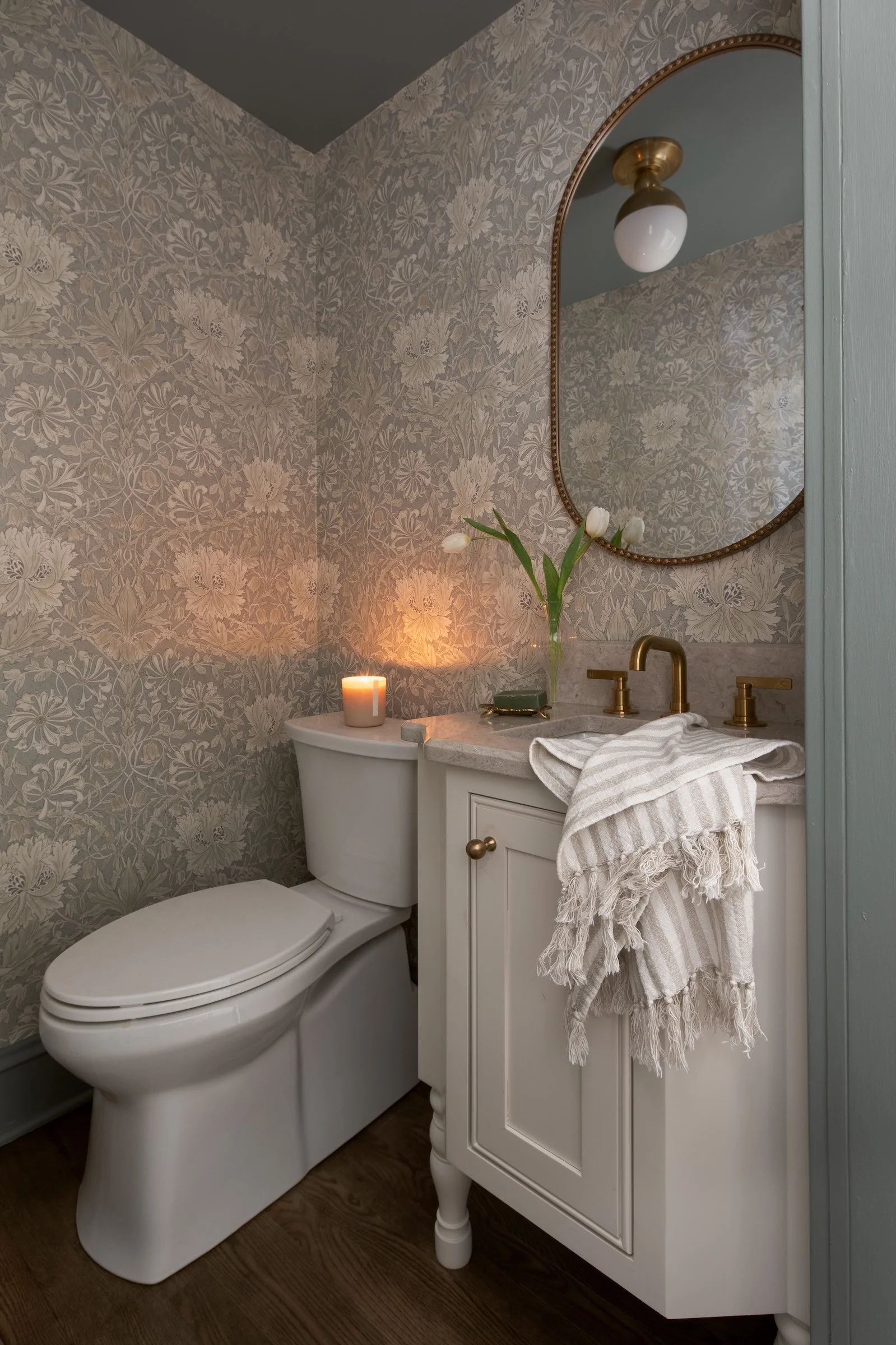 Whitefish Bay Tudor powder room with wallpaper