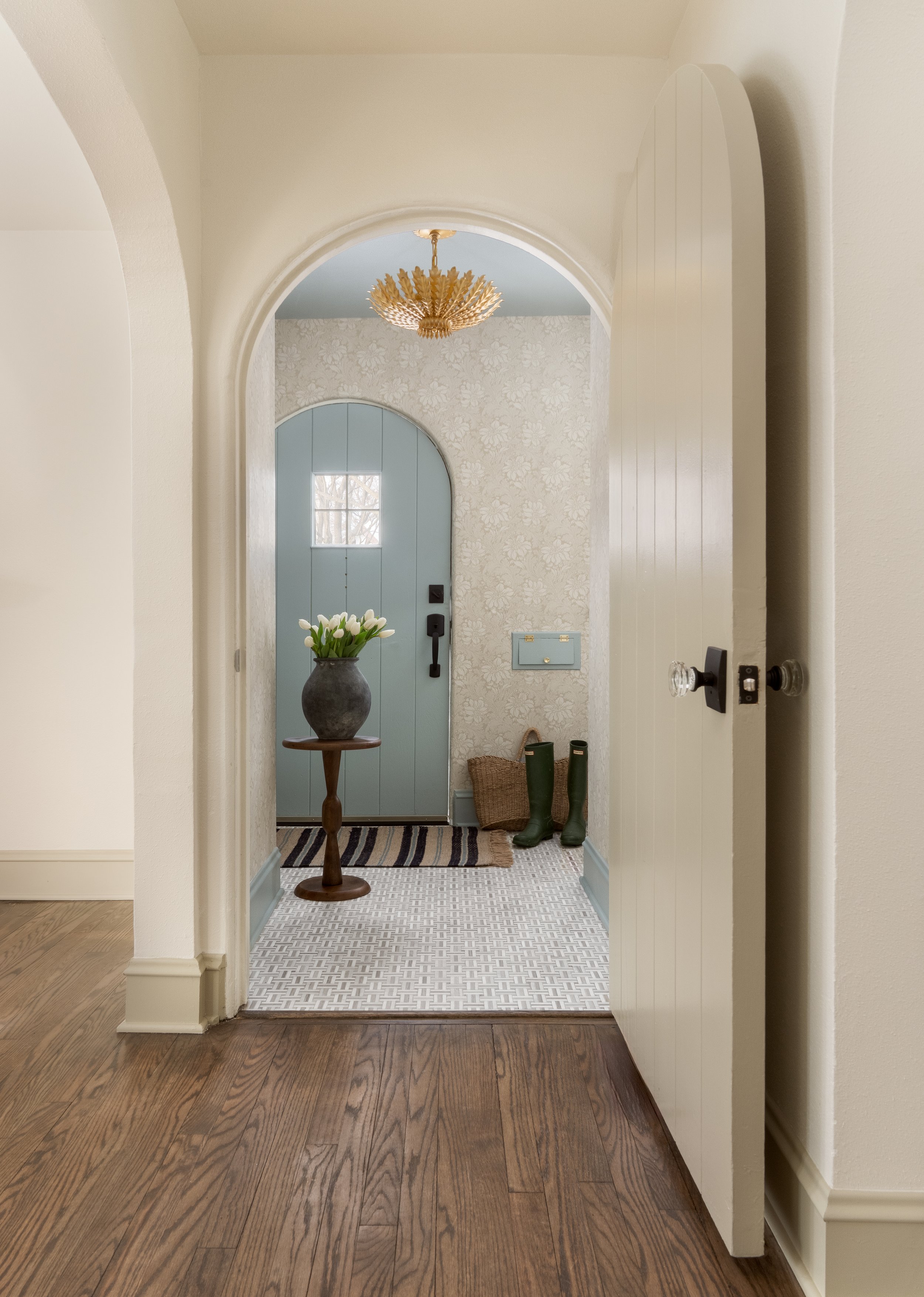 Whitefish Bay Tudor styled entryway arched doorway