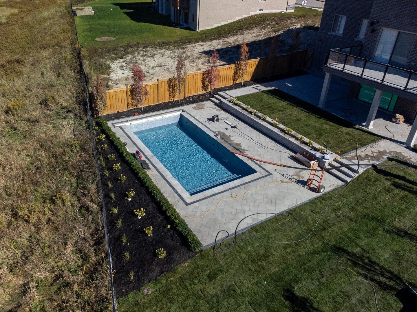 ✨ Custom Luxury. Seamless Design. Effortless Living. ✨
Transform your backyard into a private resort with our custom seamless vinyl liner swimming pools &mdash; featuring full-width vinyl-over-steel steps, electric safety covers, and bespoke landscap