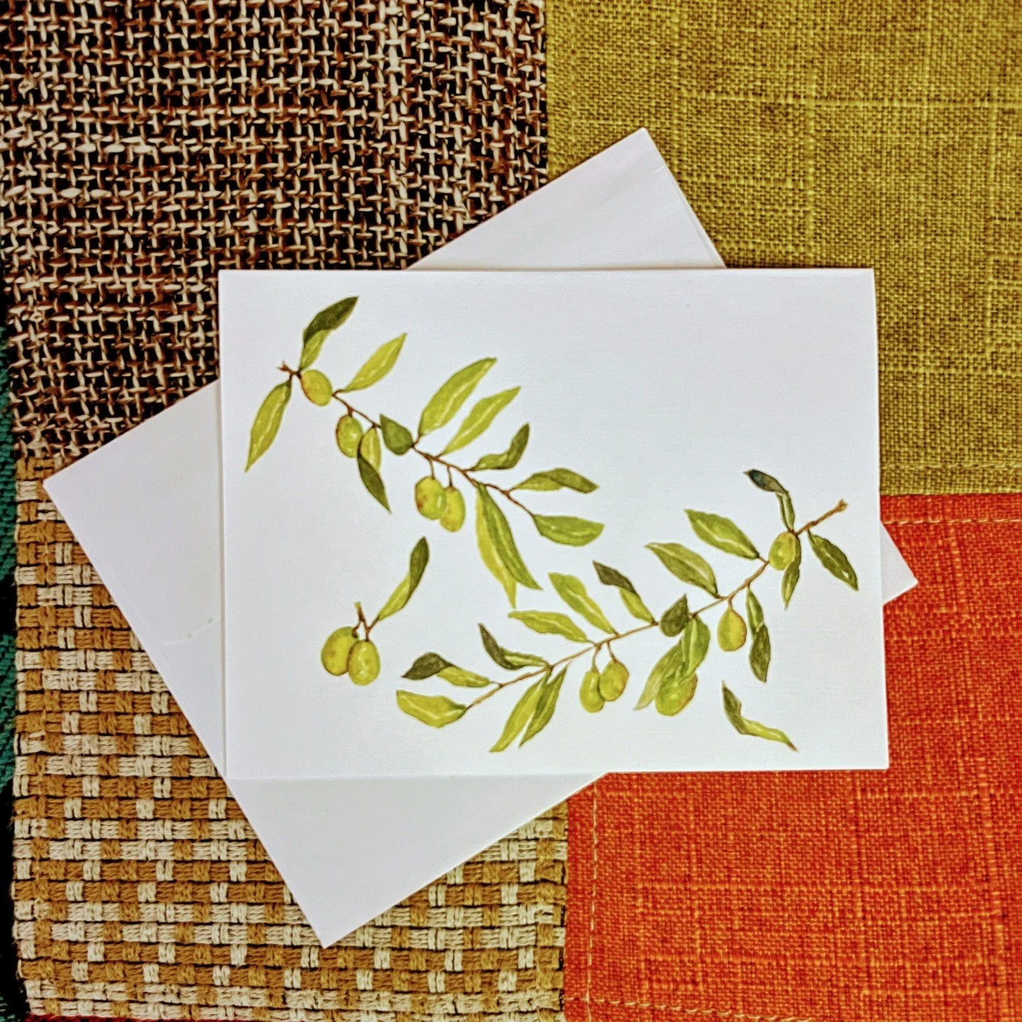 Olive branches have long been a symbol of peace and hope. I painted a watercolor of them that you can now get as a greeting card.

Text-free on the front so you can frame them or use them however you like.

A6 size (4.25 inches x 5.5 inches) and come