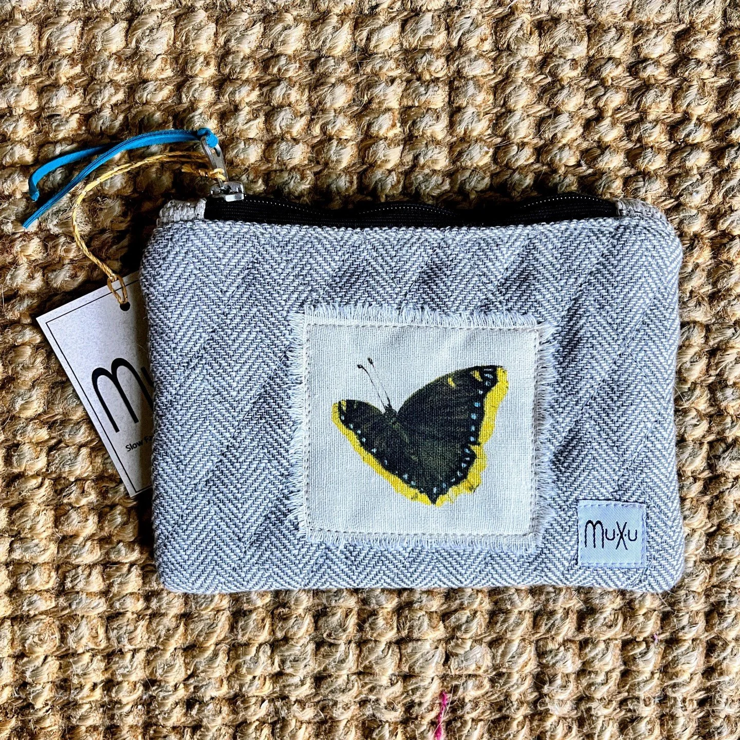 Mourning Cloak Zipper Pouch with a story

Watercolor printed, reclaimed quilted fabric, and vintage cotton lining. It could not be more special.

...Or maybe it could.

Back at the end of 2020, Salva and I visited a butterfly farm in North San Diego.