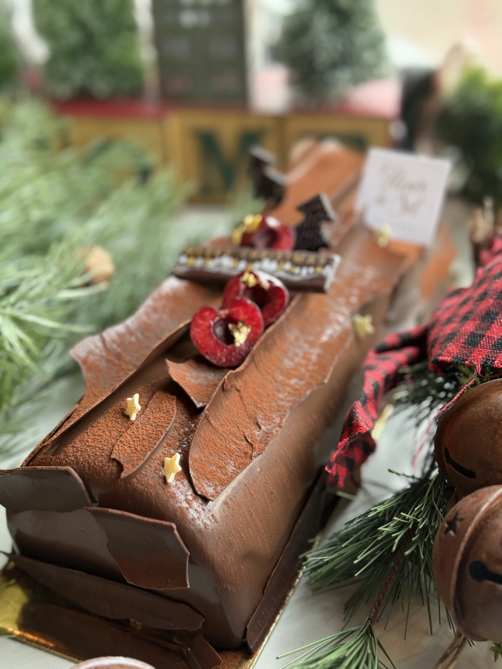 Full size Black Forest Yule Log: Layers of moist chocolate biscuit, Belgian dark chocolate mousse, brandied cherries, and fresh vanilla beans flavored Chantilly.
Full size serves 10.  $85.00
Available for pick up starting Tuesday December 16th.