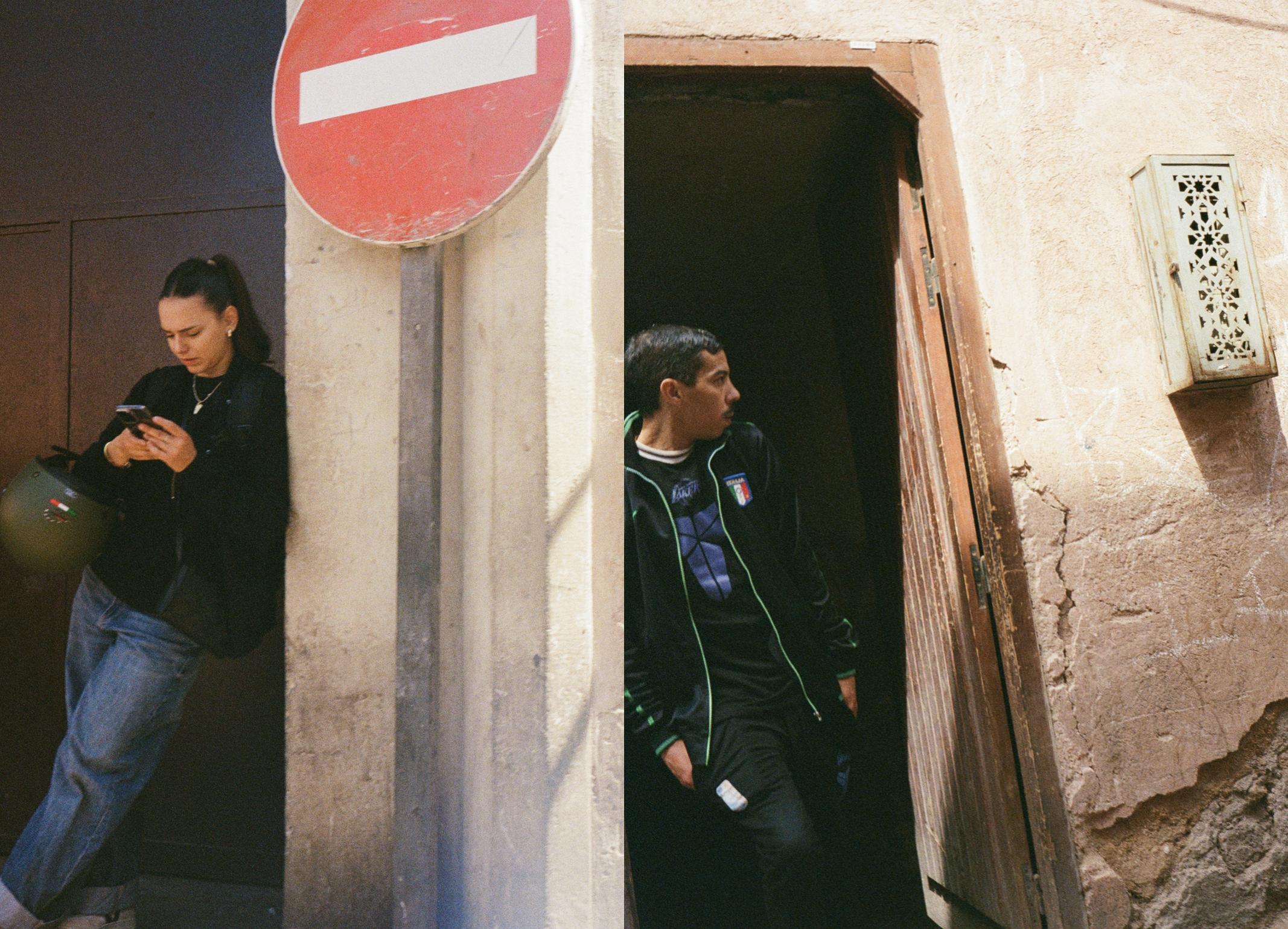 A split-image showing two people leaning against different walls. The left side features a woman with dark hair tied back, wearing a black jacket and jeans, looking at her phone with a helmet in her hand. The right side shows a man sitting in a doorway, wearing a black jacket with green accents and an Italian flag patch, gazing to the side.