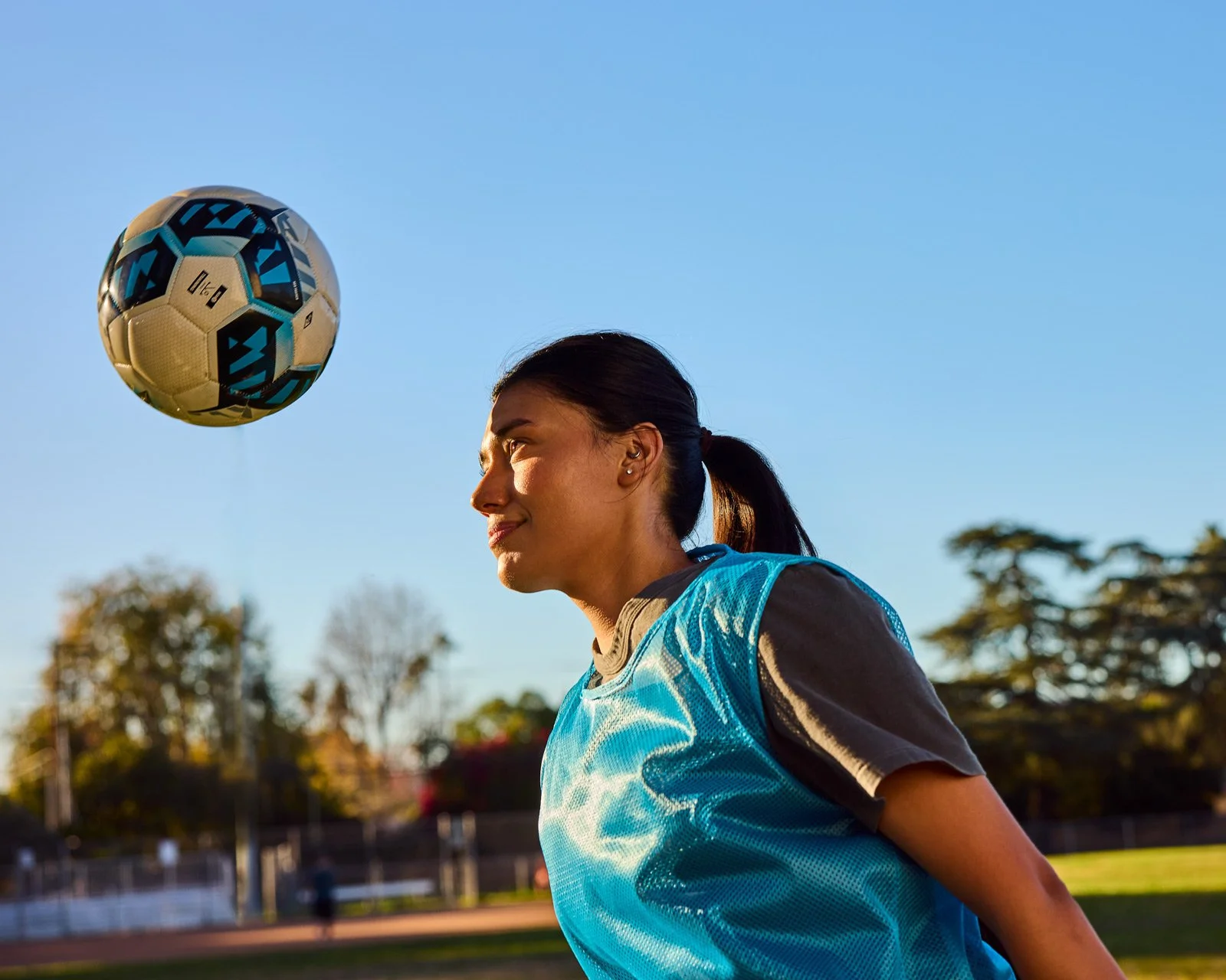 Young woman playing soccer