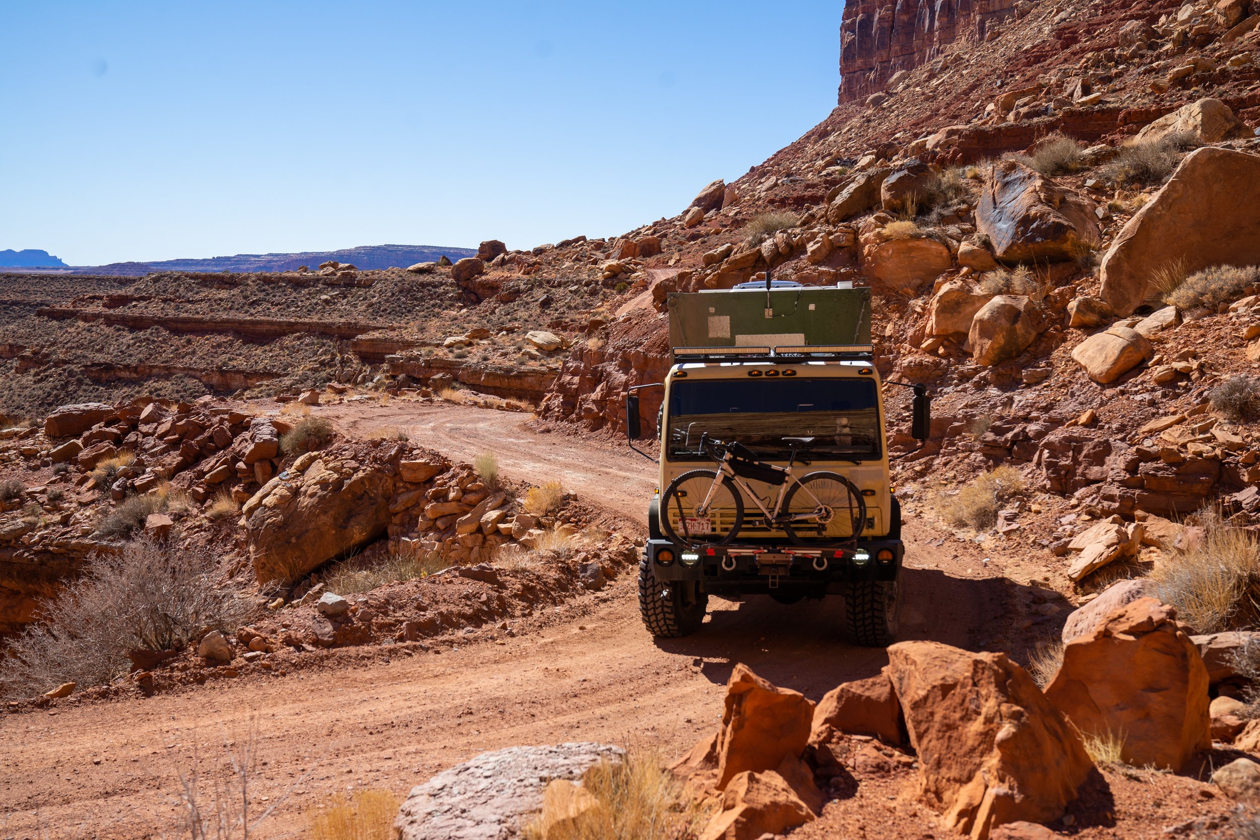 overland lmtv expedition truck camper traveling through southern utah dirt trails wanted