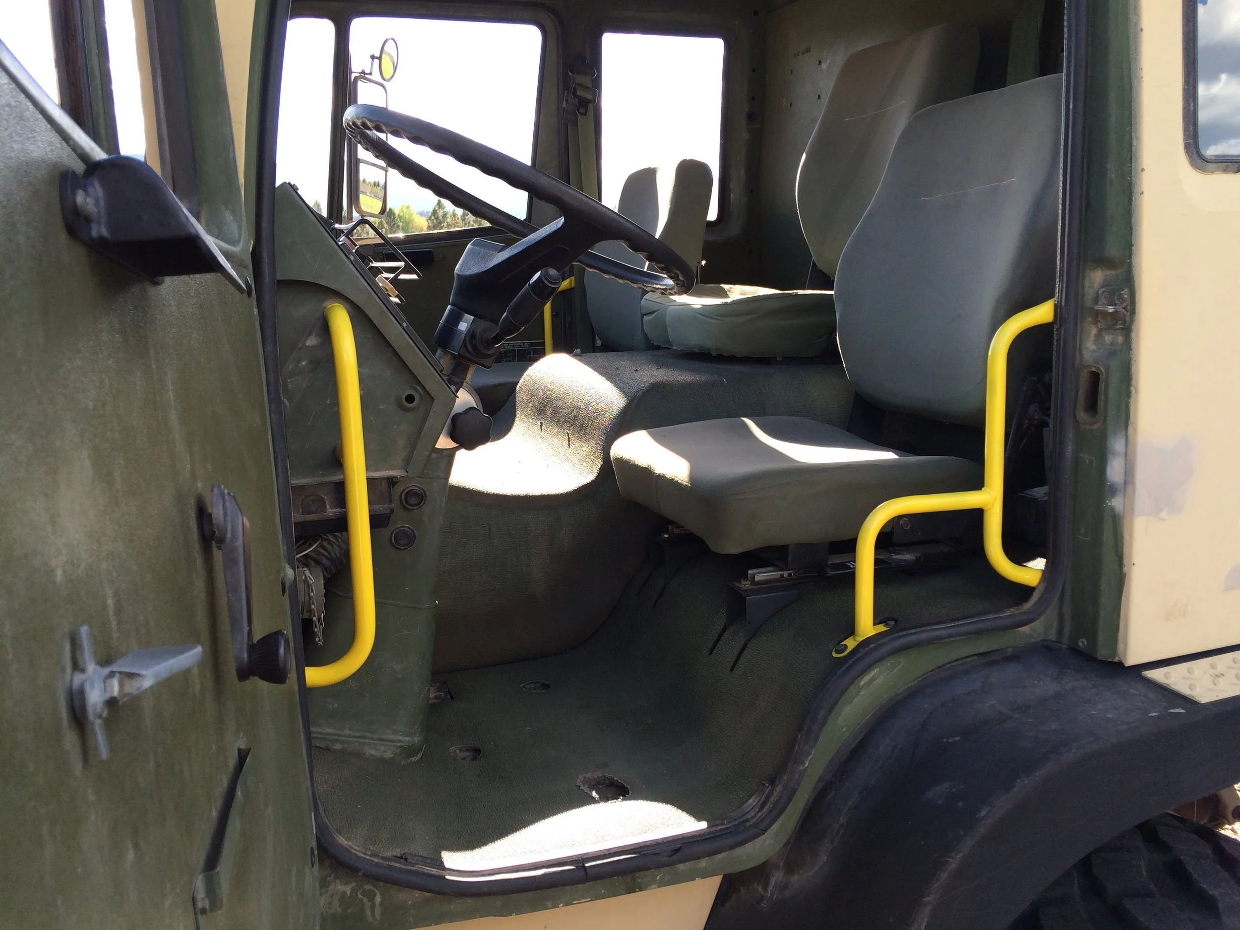 lmtv handles painted safety yellow to help passengers getting in and out of vehicle dirt trails wanted