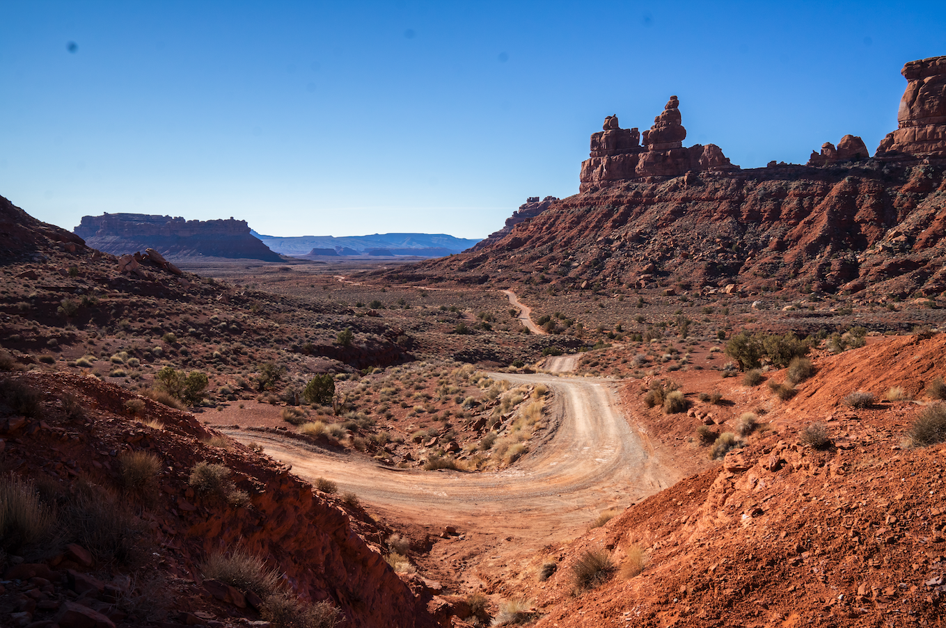 a long dirt roads winds into the southern utah desert dirt trails wanted