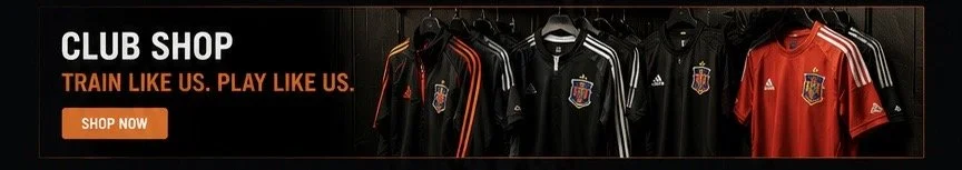 Banner advertising a club shop with sports jackets and shirts on display, featuring the text 'Train like us. Play like us.' and a 'Shop Now' button.