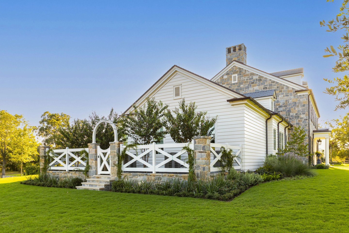 White painted siding meets Pennsylvania fieldstone. When our clients ask for authentic, we source materials that tell their own story before we even begin building.

Architecture: @reagan_andre_architecture
Landscape: @eauxgram

#CustomHomeBuilder #L