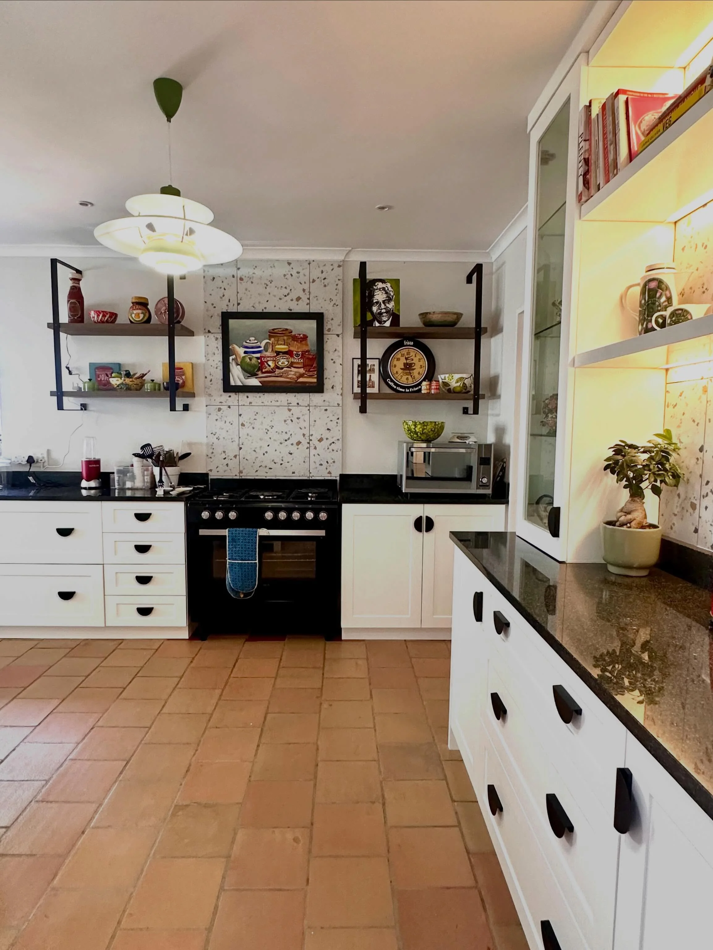 House 28 Myrtle Kitchen Revamp.
South African quirks set against crisp white shaker doors and avant garde ironmongery. 
Swipe for before