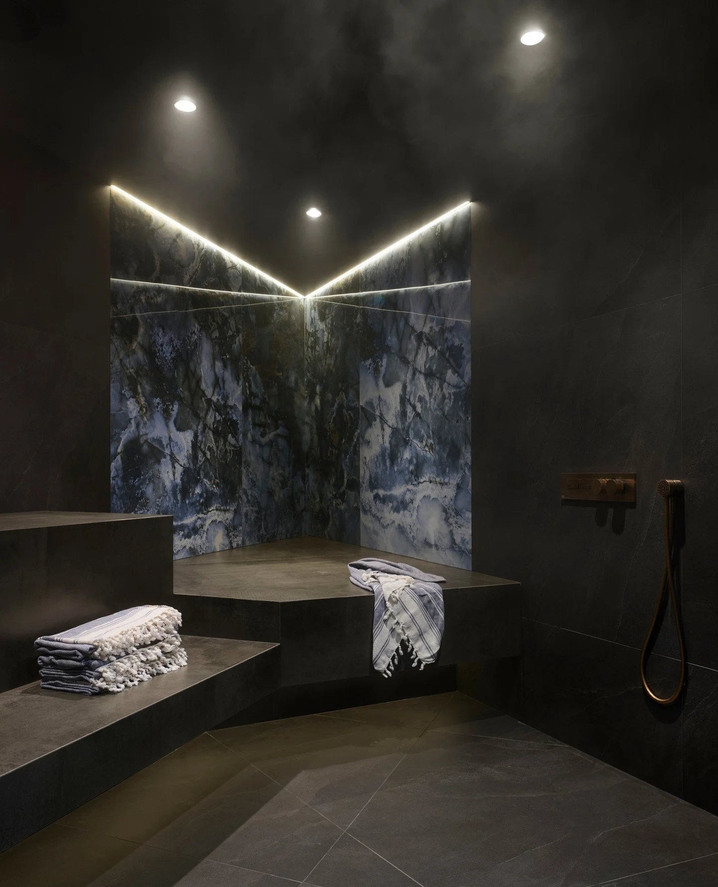 Step into serenity 💙. We designed this home spa to wrap you in steam and aromas of eucalyptus. A sanctuary built for stillness after a long day. 
*
*
Design: @bluedesignstudio.ca
@stratadesign.development_inc
@craftsmanreno
📸 @alexlukey
@laurabrans