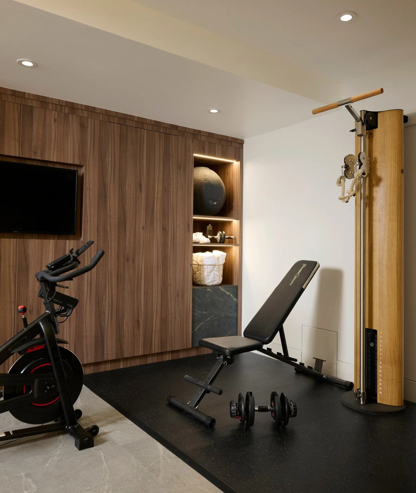 Discipline meets design. 🥇 This luxury home gym is more than a workout space &mdash; it&rsquo;s a sanctuary of strength, wrapped in rich tones, luxe textures, and unapologetic style. Because every rep deserves a room that rises to the occasion. 💪🏽
