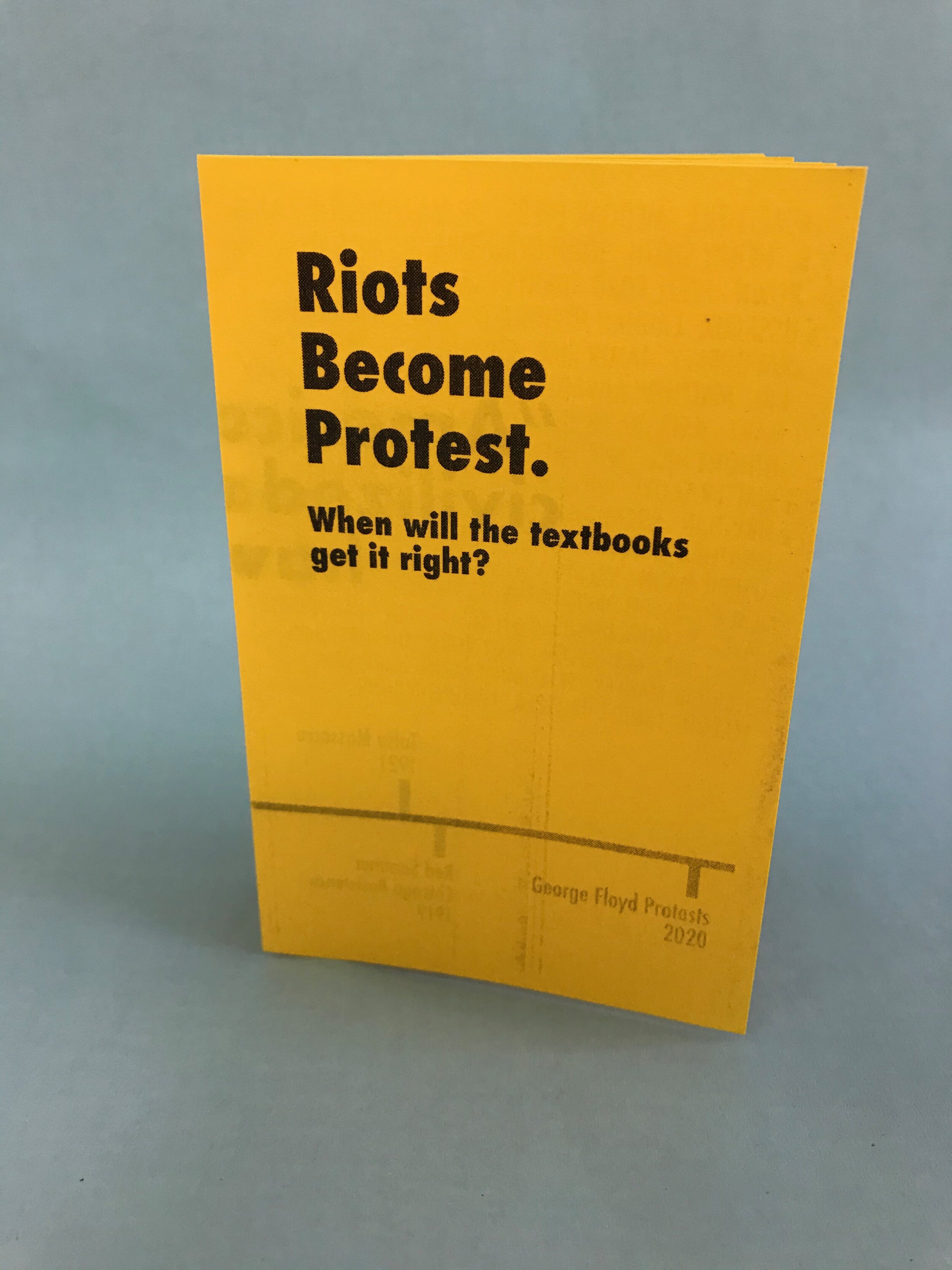 Thompson_Nikki_BLM protest textbooks cover.jpeg