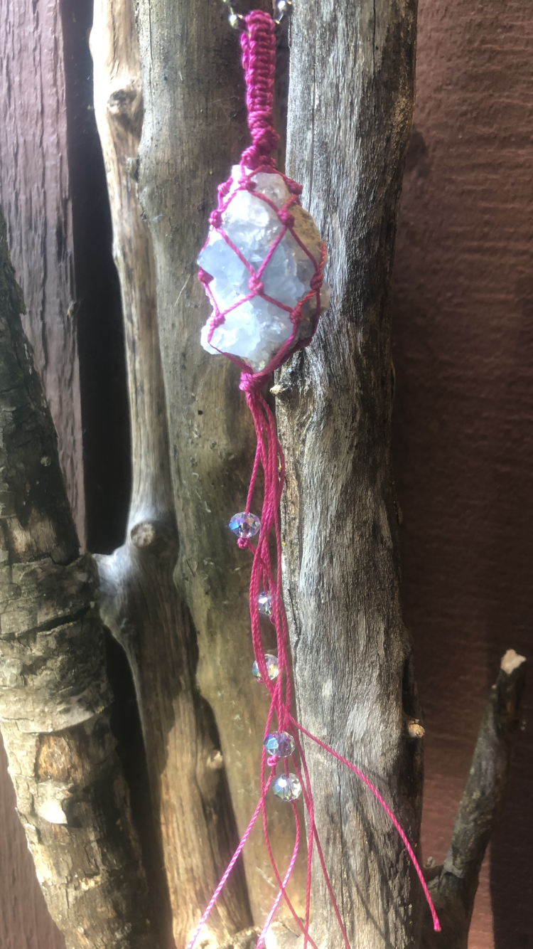 Celestite Wrapped In Hot Pink Macrame Adorned In Reflective Crystals