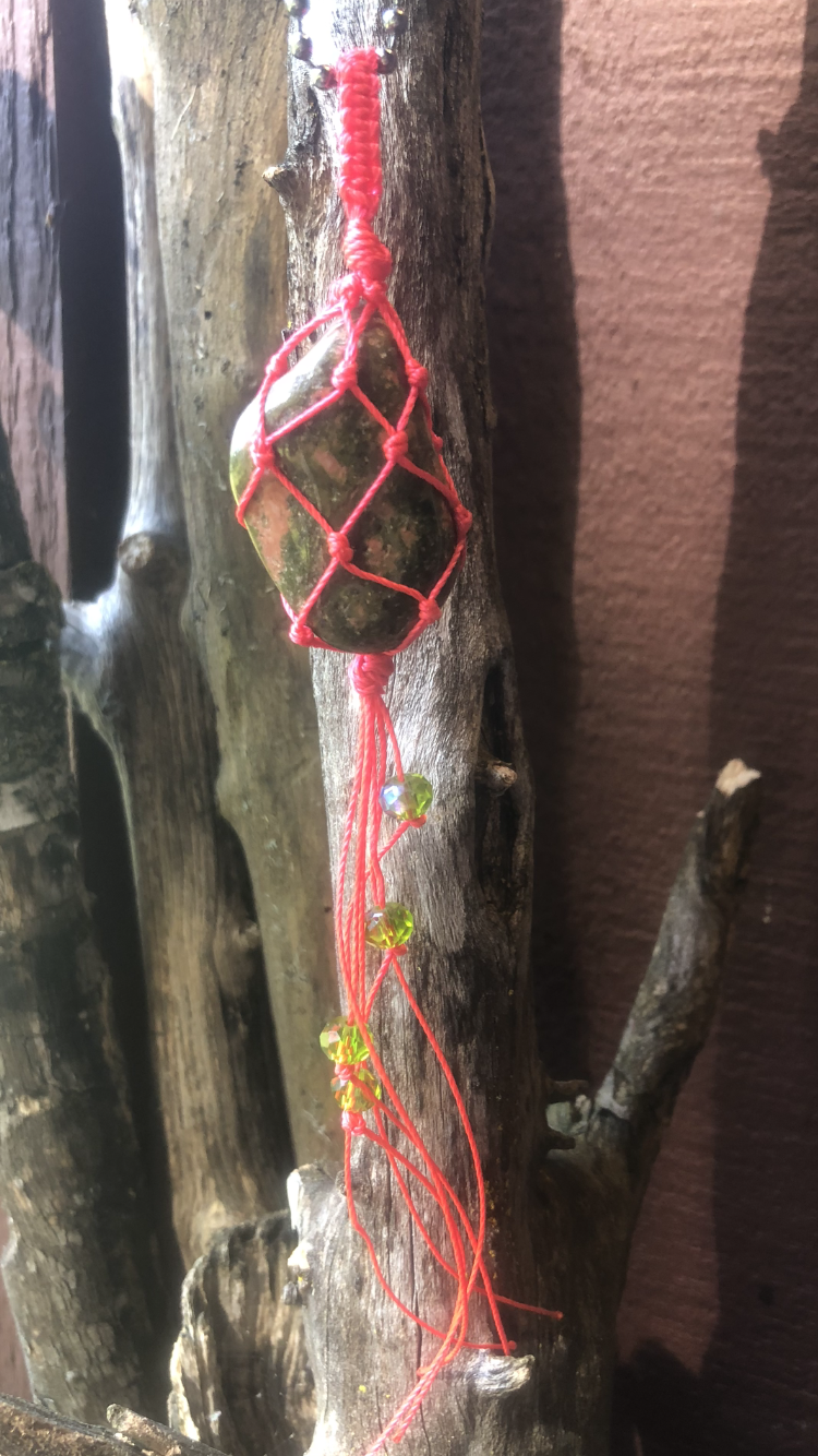 Unakite Wrapped In Neon Red Adorned With Reflective Crystals