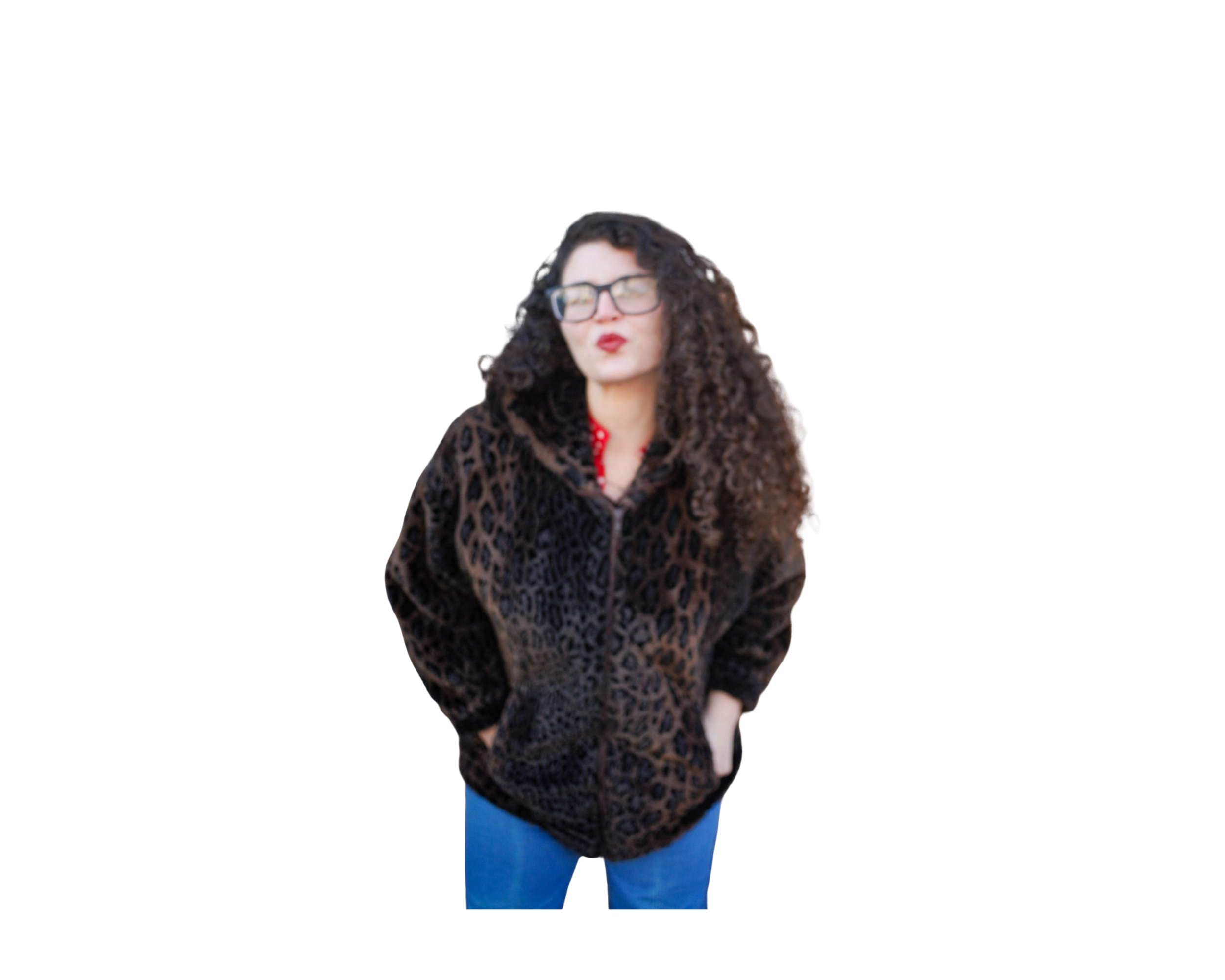 Meryl, somatic sex coach, wearing a brown leopard coat, leaning forward and blowing a kiss