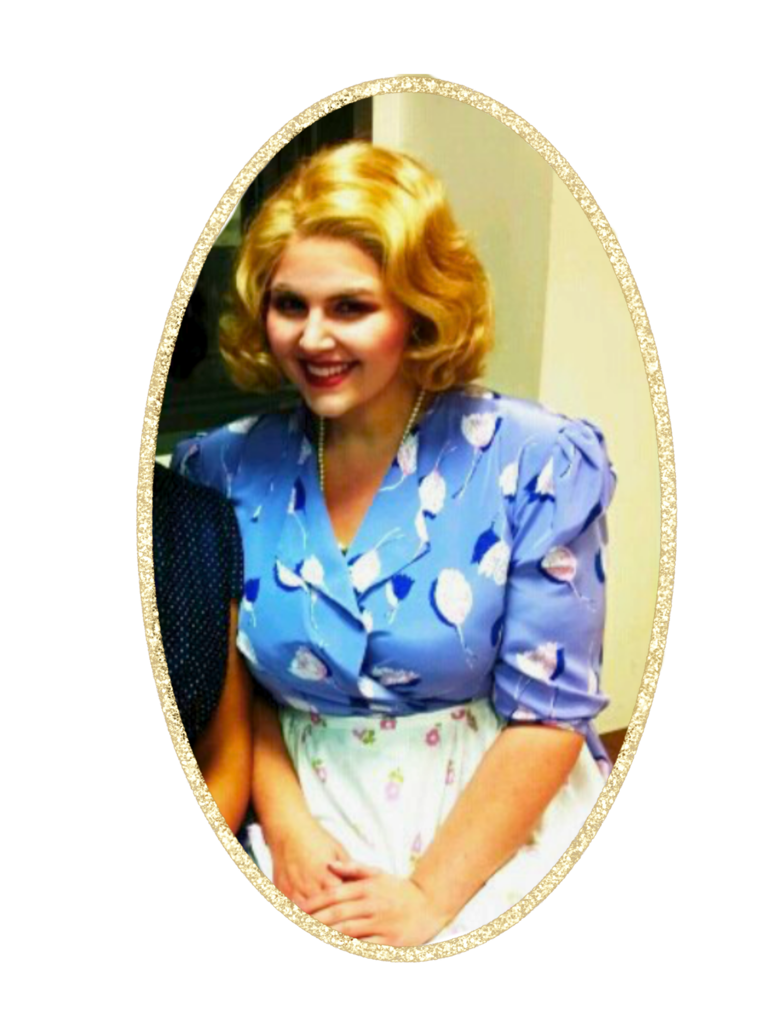Meryl, in costume as a blonde wearing a blue dress